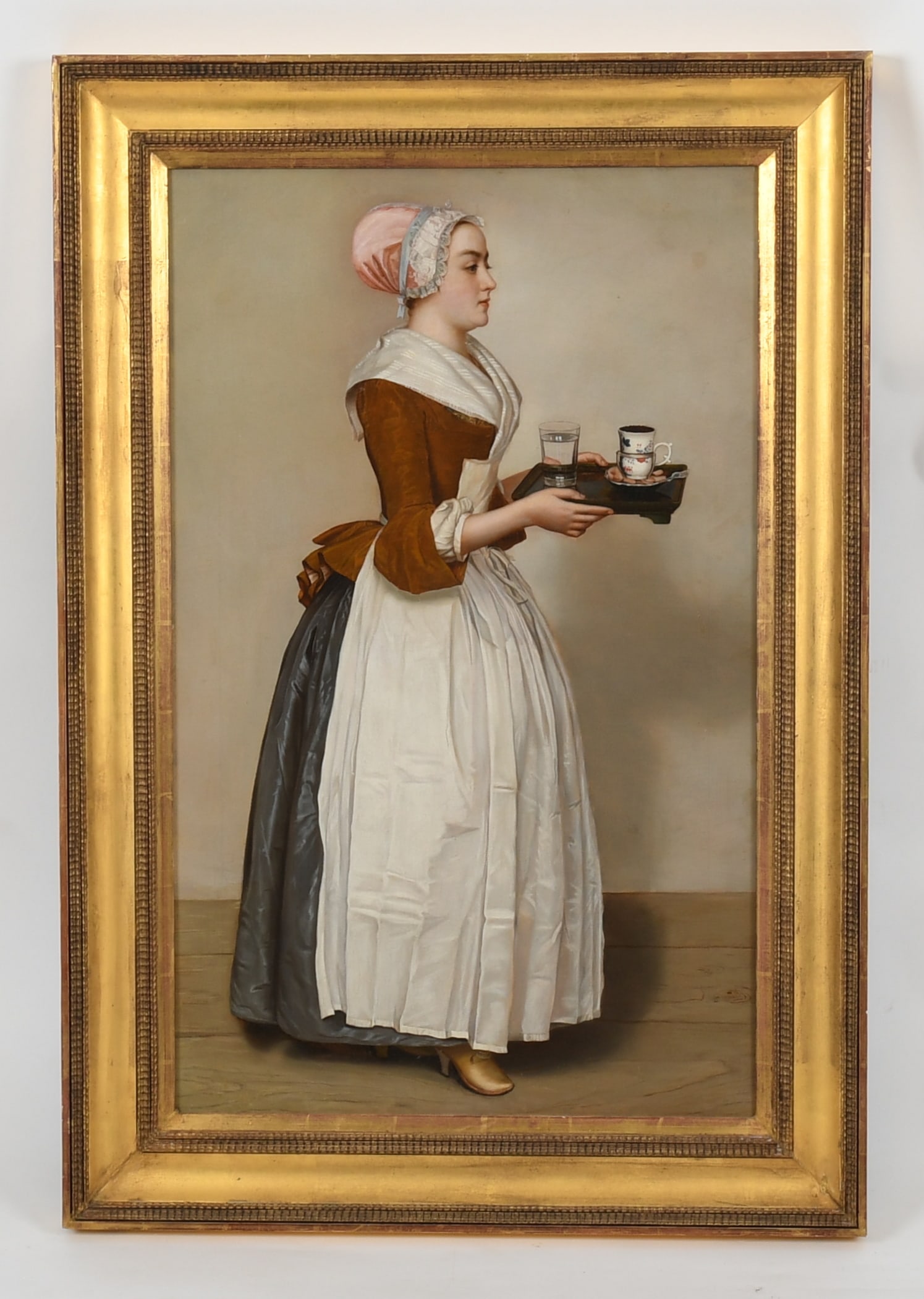 After Jean Etienne LIOTARD, La Belle Chocolatiere: After Jean Etienne LIOTARD, La Belle Chocolatiere A 19th century unsigned copy of the well-known work. Oil on Canvas. Dimensions: 34in x 21in, the frame 41in x 28in. 