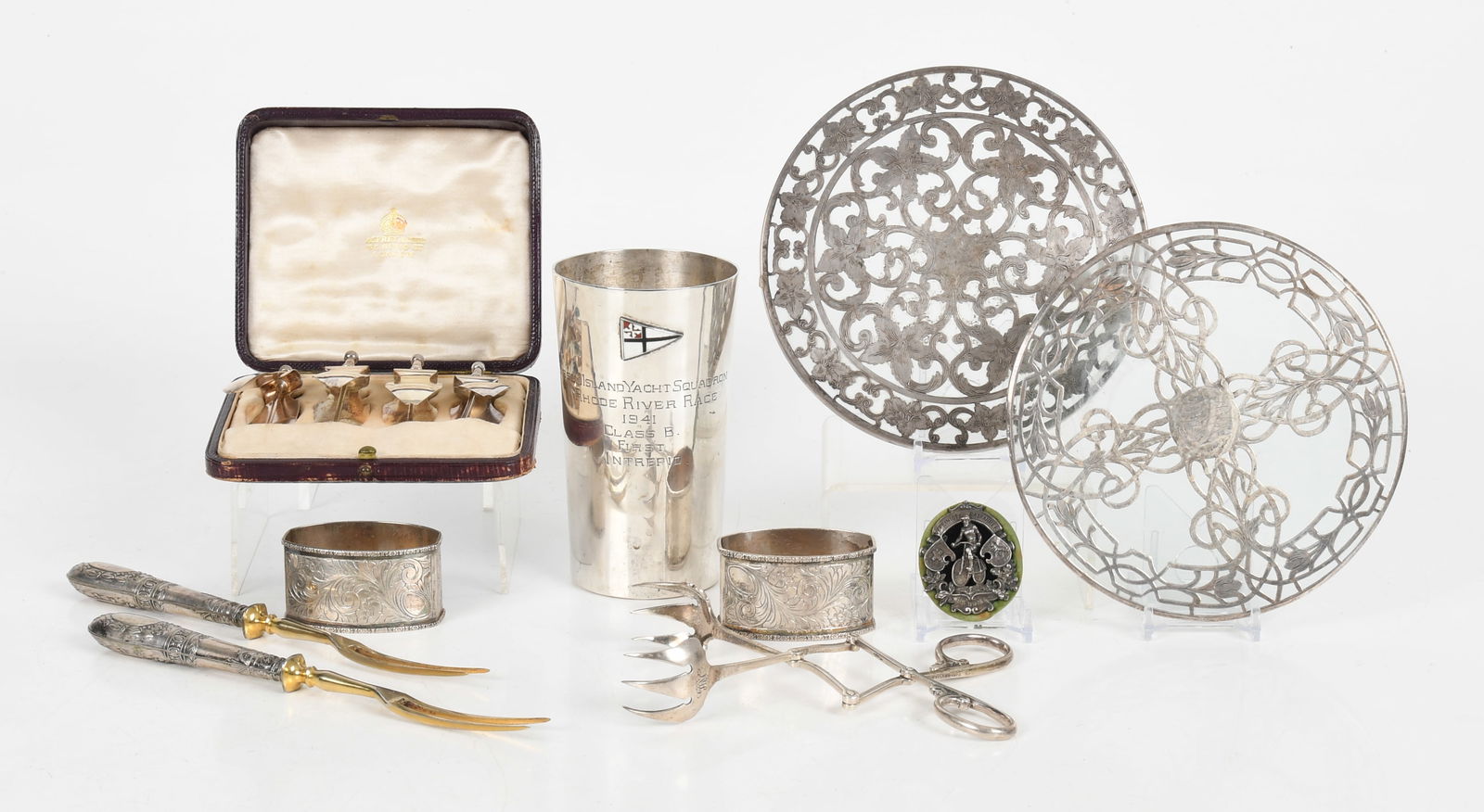 A Group of Assorted Silver and Decorative Items: A Group of Assorted Silver Items Various countries of origin, circa late 19th century to the first half of the 20th century, comprising: two 2 1/4" napkin rings in .800 silver