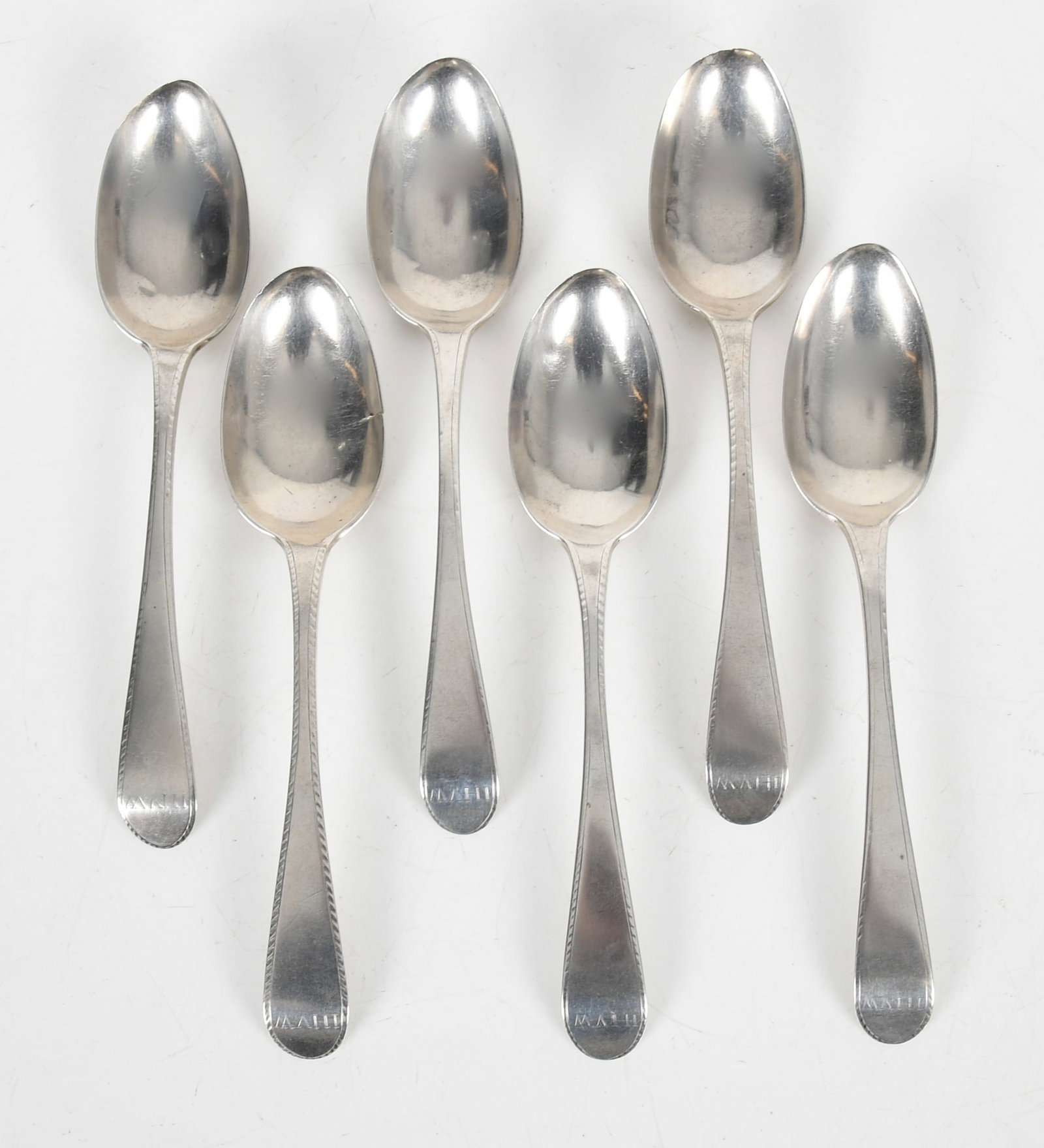 A Set of Feathered Edge Coin Silver Spoons by William Grigg (1 of 4)