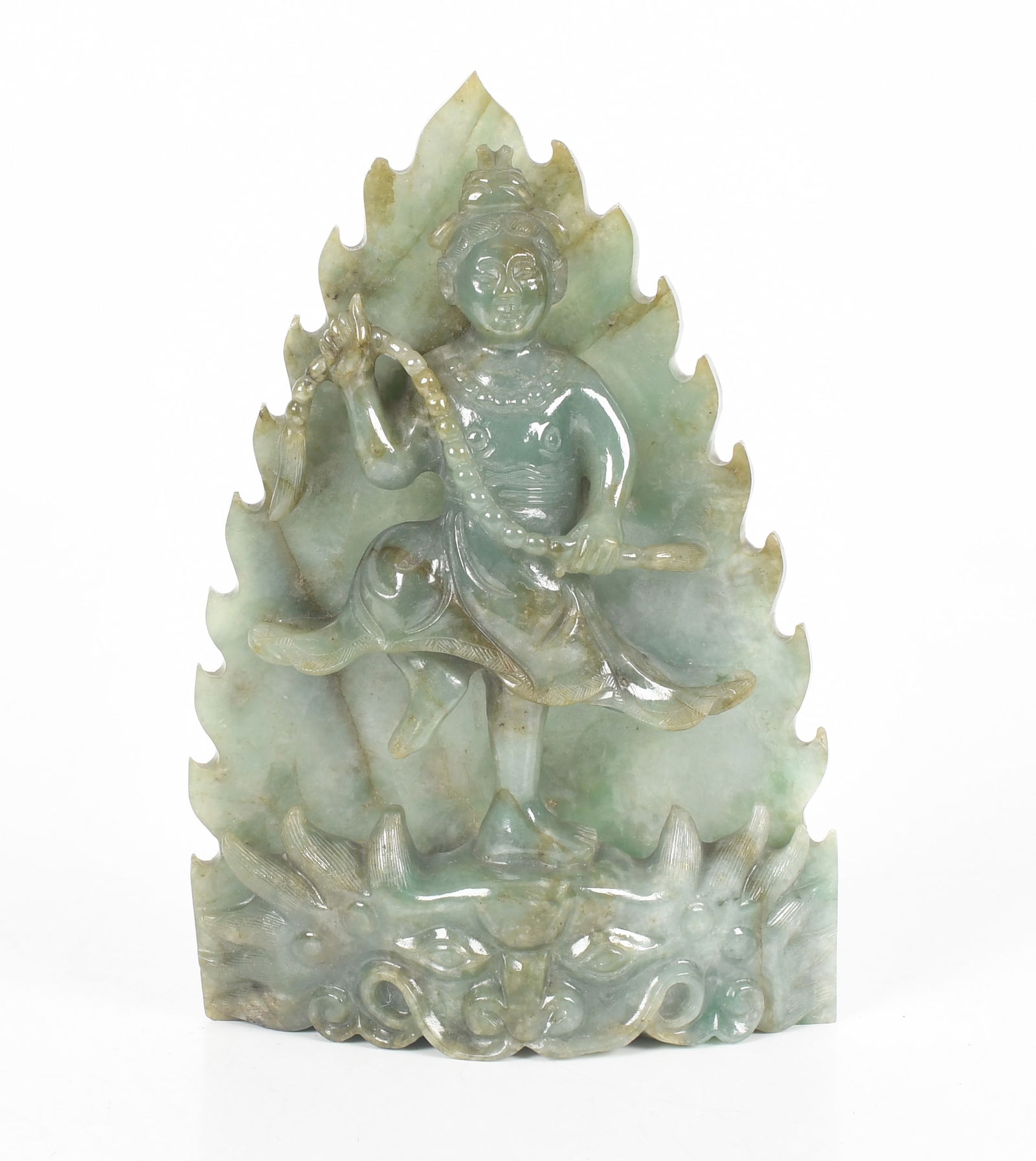 An Asian Jade Figure of an Immortal: An Asian Jade Figure of an Immortal A 20th century example depicting a dancing figure standing upon an animal mask. Dimensions: 6in x 1 1/2in, the height is