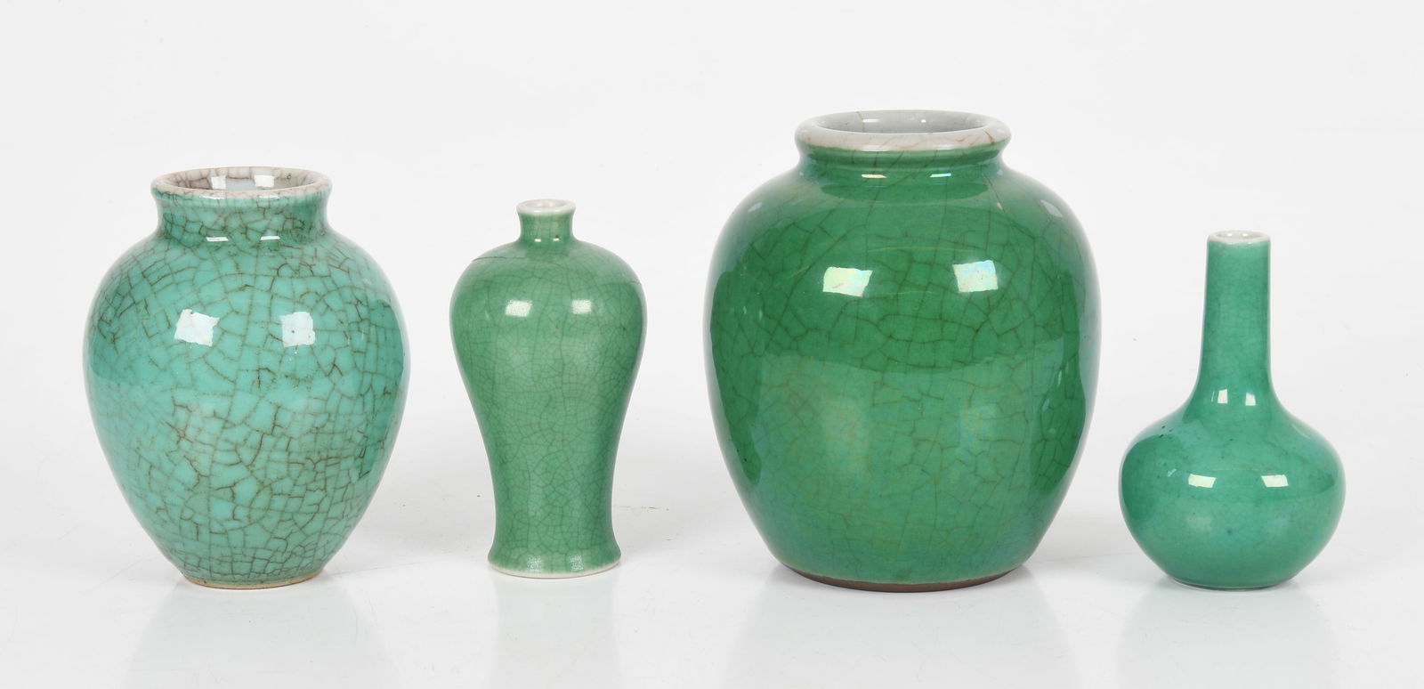 A Group of Four Chinese Qing Dynasty Apple Green-Glazed Porcelain Vessels, 19th Century (1 of 12)