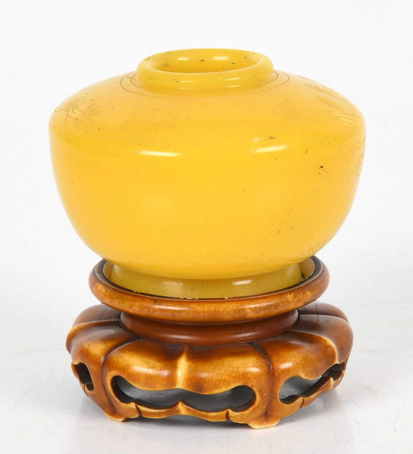 A Chinese Yellow Peking Glass Etched Vase, 19th Century: A Chinese Yellow Peking Glass Etched Vase, 19th Century With etched bamboo and floral designs; on a carved stand. Dimensions: 2 3/4 in. high (vase); 4 1/4 in. high (vase on