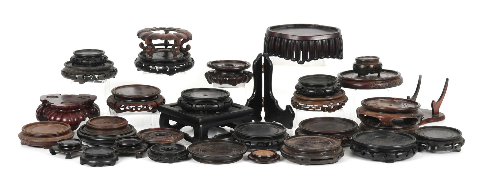 A Collection of Chinese Carved Hardwood Stands, 19th Century and Later (1 of 15)