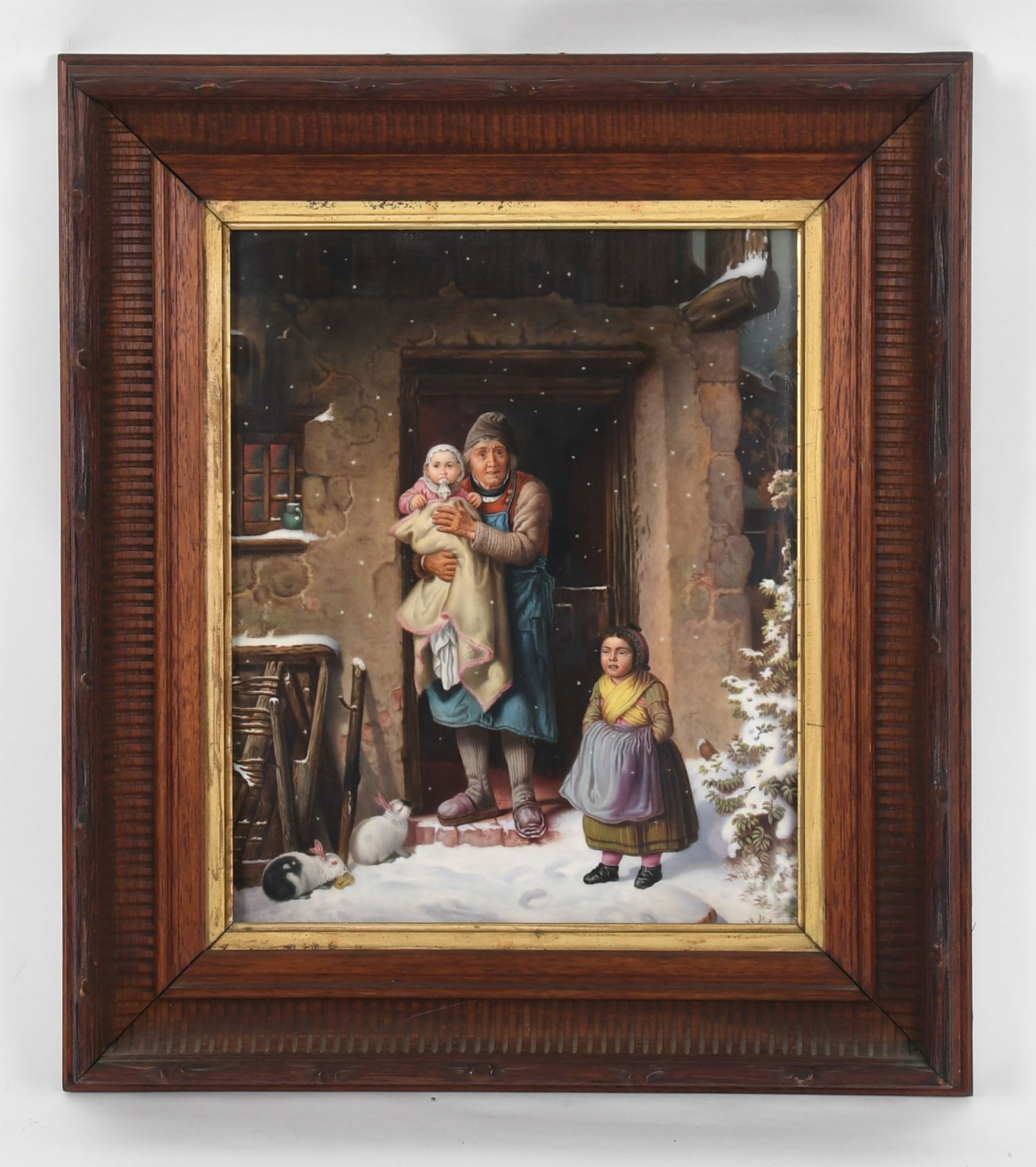 A Berlin KPM Painted Porcelain Plaque after Georg Bischoff, Late 19th/ Early 20th Century: A Berlin KPM Painted Porcelain Plaque after Georg Bischoff, Late 19th/ Early 20th Century After the painting "The First Snow," depicting an elderly man in a doorway with two children