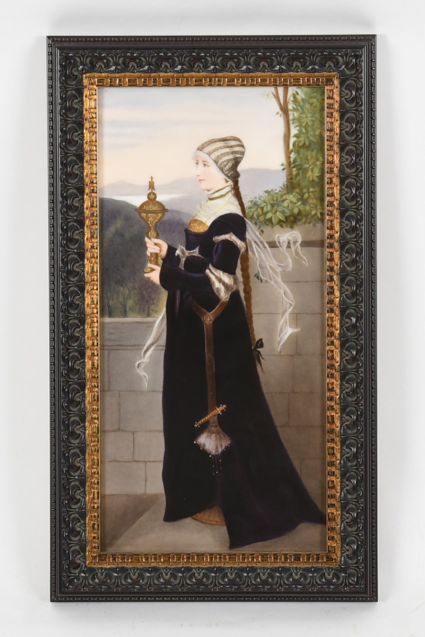 A Berlin KPM Porcelain Plaque of a Medieval Lady, Late 19th/ Early 20th Century: A Berlin KPM Porcelain Plaque of a Medieval Lady, Late 19th/ Early 20th Century Depicting a standing lady in Medieval dress holding a chalice with a landscape beyond, possibly after the painting