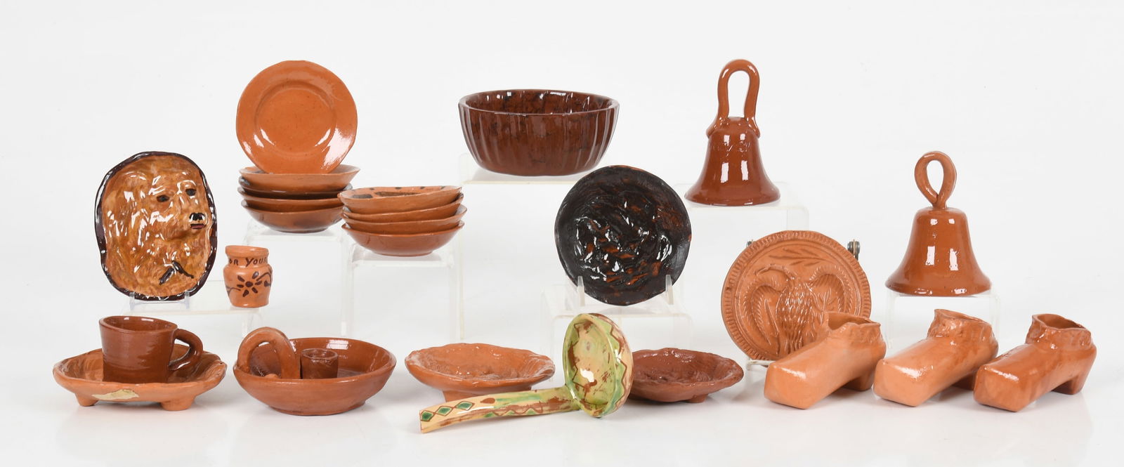 1950's Chalfont Pennsylvania Redware by Fort Bumer, Including Bells and Trays: 1950's Pennsylvania Redware by Fort Bumer, Including Bells and Trays By Paul Boehret, comprising: two 4 1/2in tall bells one dated for 1955 and the other incised "Liberty