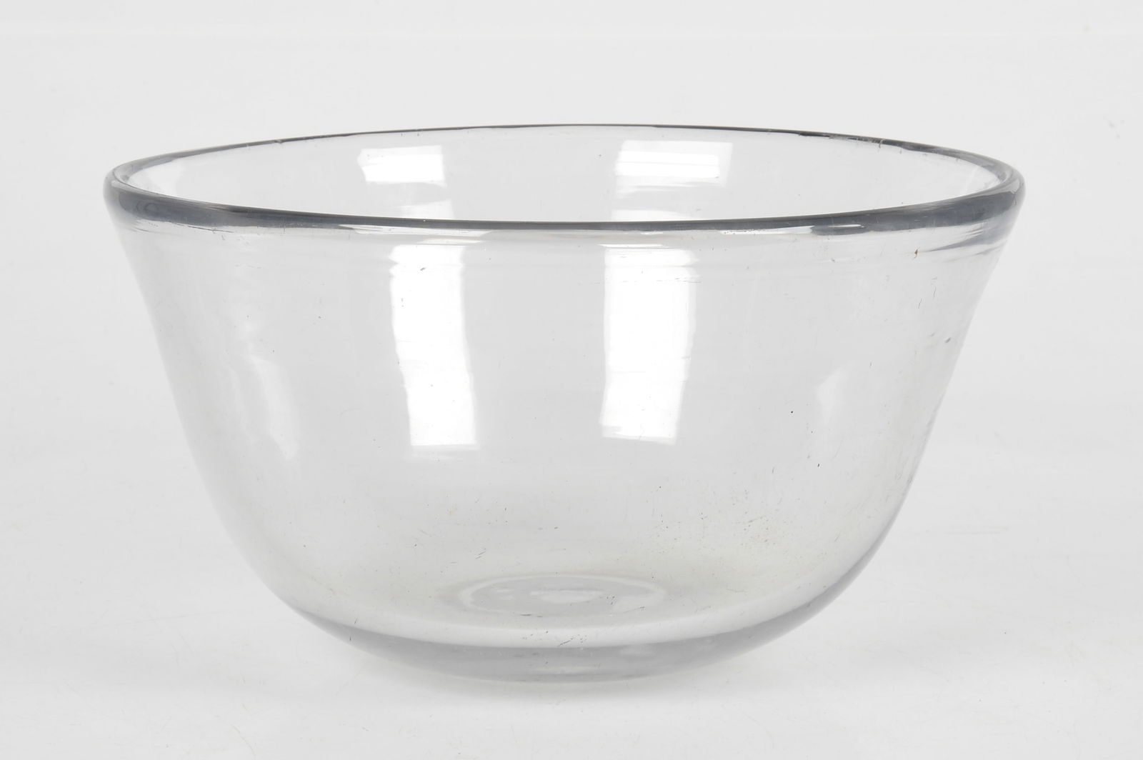 A Large 19th Century Flint Glass Bowl: A Large 19th Century Flint Glass Bowl A large and heavy bowl with tool marks and broken pontil mark. Dimensions: 14 1/2in diameter, the height is 8in. The approximate weight is