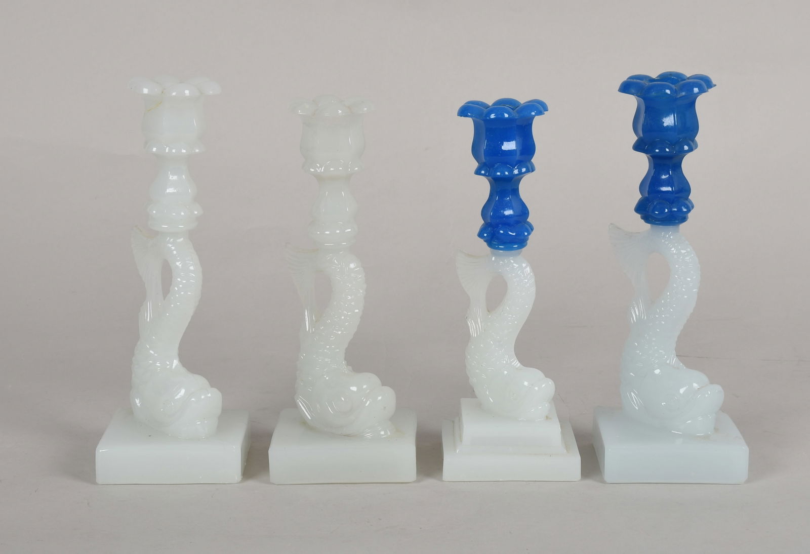 A Group of Four Boston Sandwich Glass Pressed Dolphin Candlesticks, Third Quarter 19th Century (1 of 10)