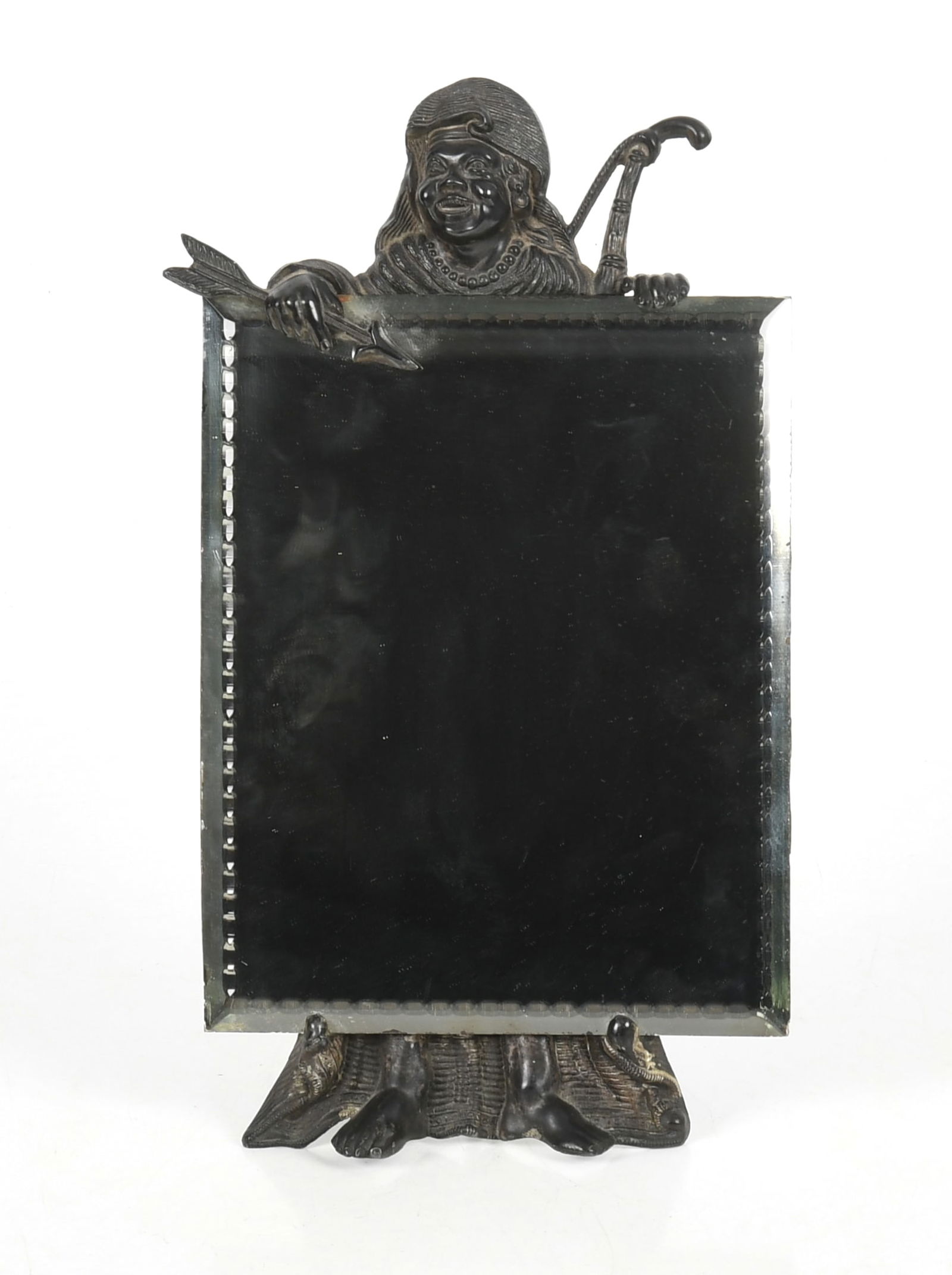 A Blackamoor Silver Plated Table Mirror: A Blackamoor Silver Plated Table Mirror Early 20th century, a rectangular mirror being held by a stand in the form of a man with a bow and arrow. Dimensions: the
