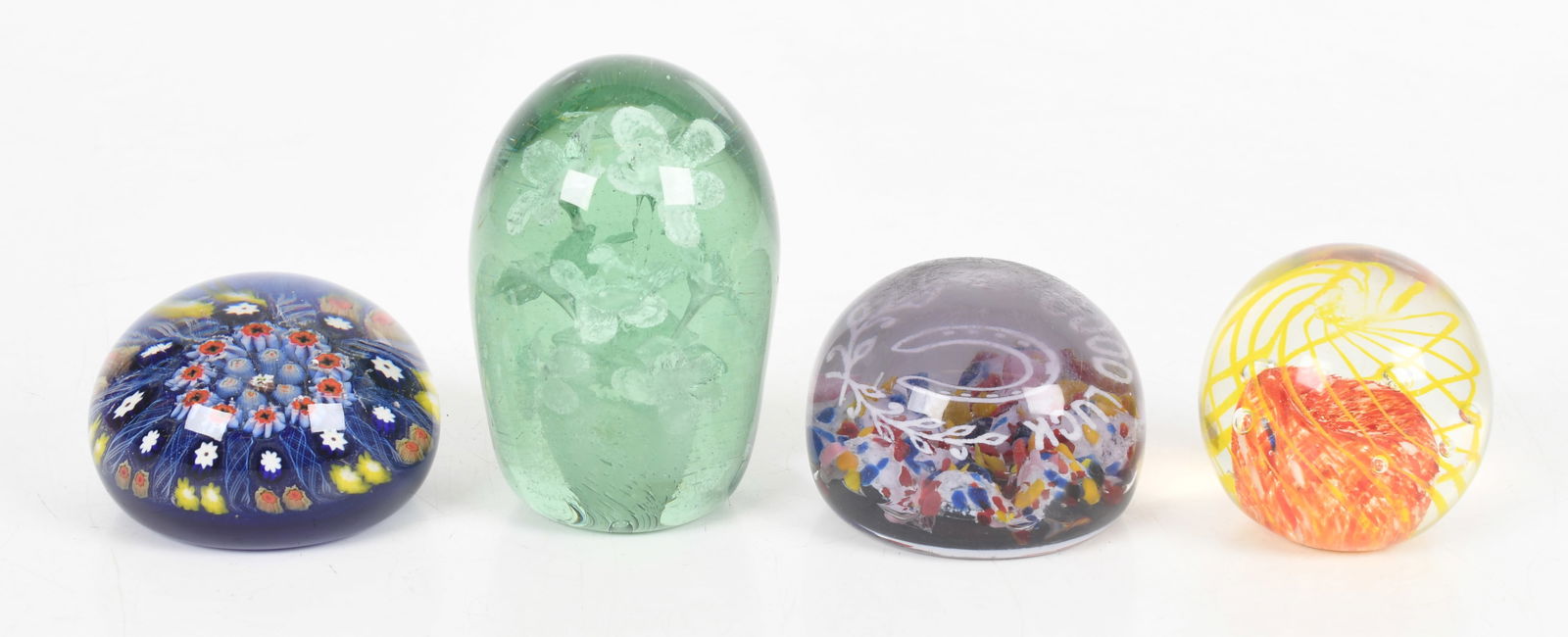 Four Antique Paperweights, One Millefiori Example: Four Antique Paperweights, One Millefiori Example First half of the 20th century, comprising: a millefiori paperweight with a blue ground and "Spoke" pattern featuring ten radial