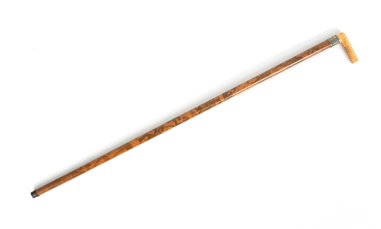 An English Penwork Cane, Late 19th/ Early 20th Century: An English Penwork Cane, Late 19th/ Early 20th Century With a bone handle above pressed metal band engraved with initials. The body of the cane with elaborate penwork featuring the English