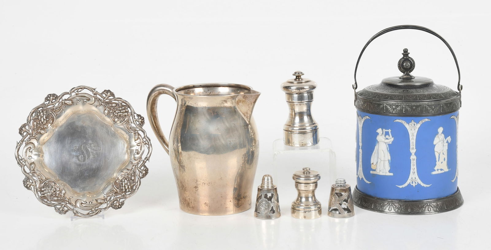 An Assorted Group of Sterling Silver: An Assorted Group of Sterling Silver Comprising: a 7in monogrammed tray with relief decoration of flowers by Redlich & Co., a Paul Revere reproduction 6 1/2in tall jug by Reed and