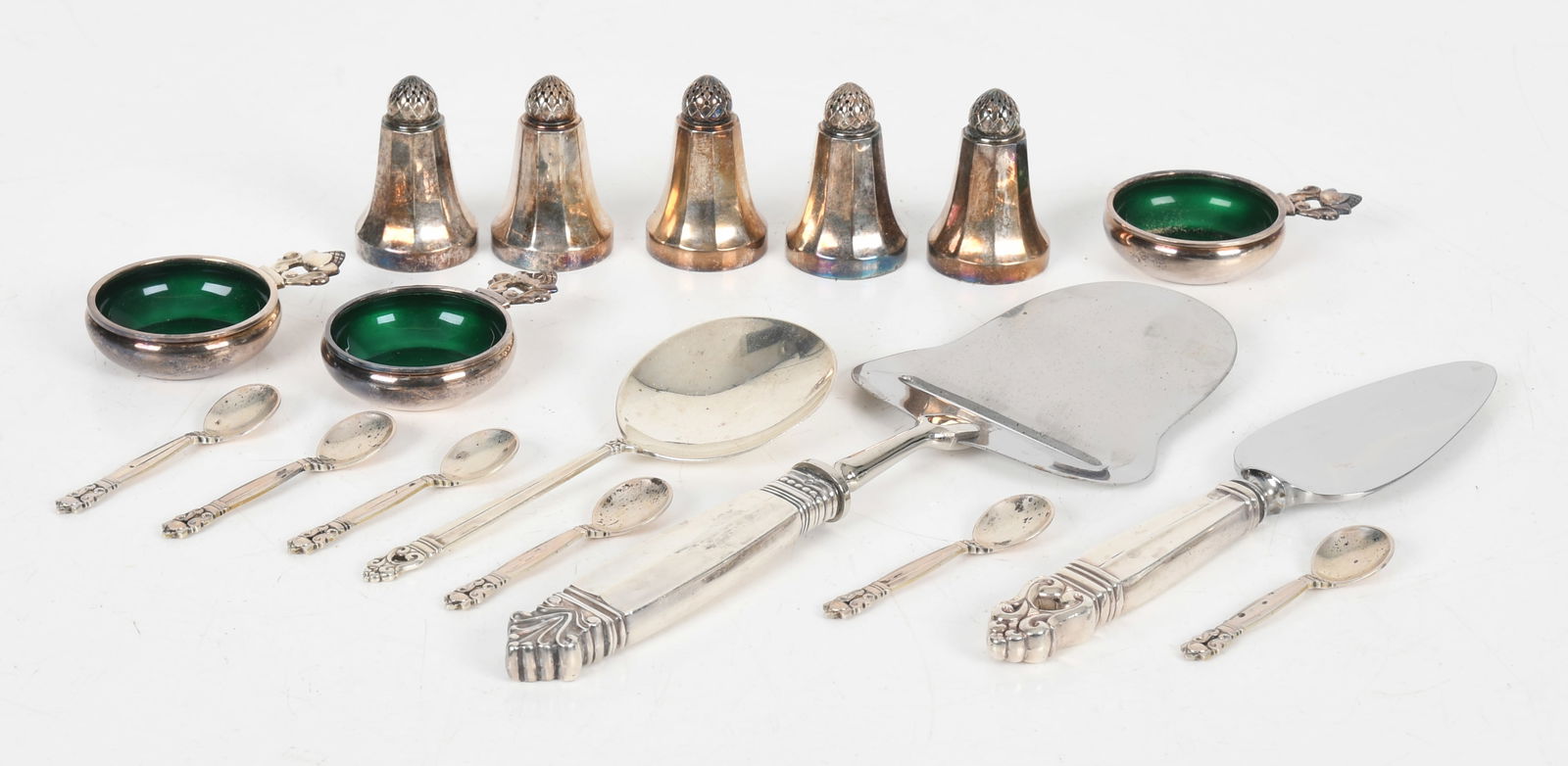 A Group of Danish Sterling Silver, Including Jensen: A Group of Danish Sterling Silver, Including Jensen 20th century, comprising: three 1 5/8in diameter green enameled acorn salts by George Jensen, five 1 1/2in tall salt/pepper