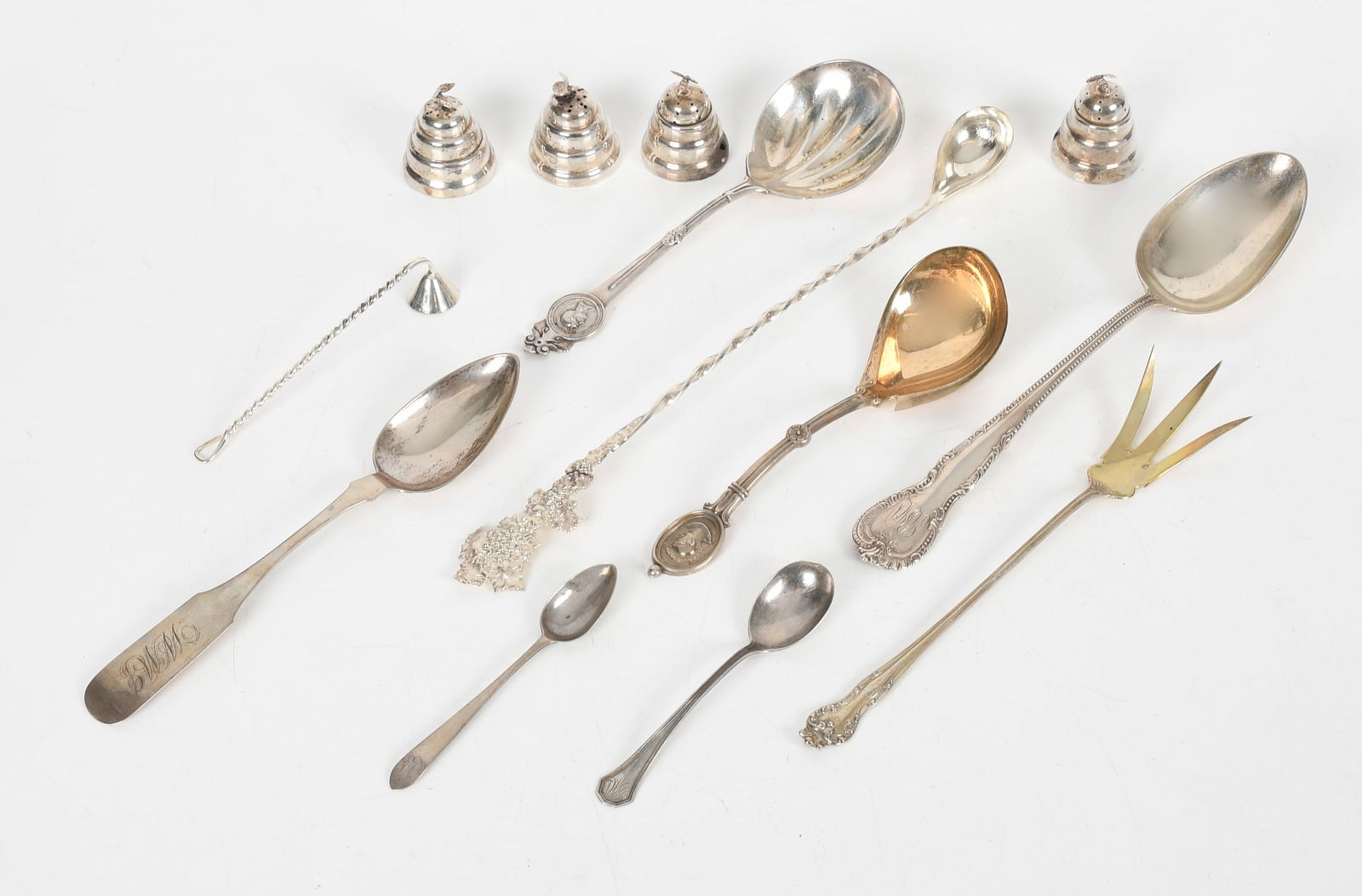 A Group of Sterling Silver Table and Flatware: A Group of Sterling Silver Table and Flatware Late 19th and first half of the 20th century, comprising: a 11 1/4in serving spoon (with mount for a bowl) by Bailey, Banks, and Biddle,