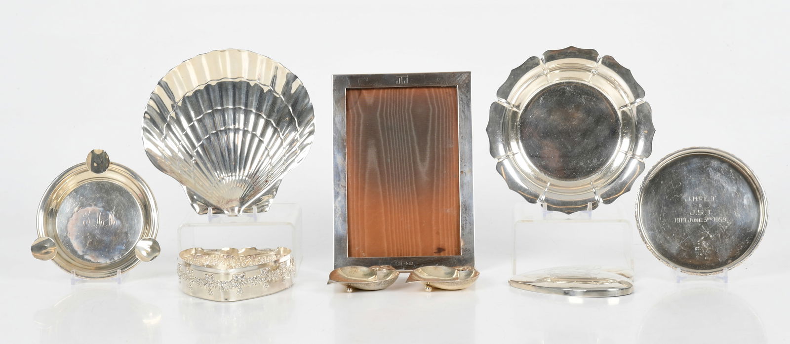 Sterling Silver Tableware, Including Tiffany & Co.: Sterling Silver Tableware, Including Tiffany & Co. 20th century, comprising: a 6in scallop tray by Tiffany & Co., a 5 3/4in tray by Lunt after a Dublin 1720 example, a 4 3/8in