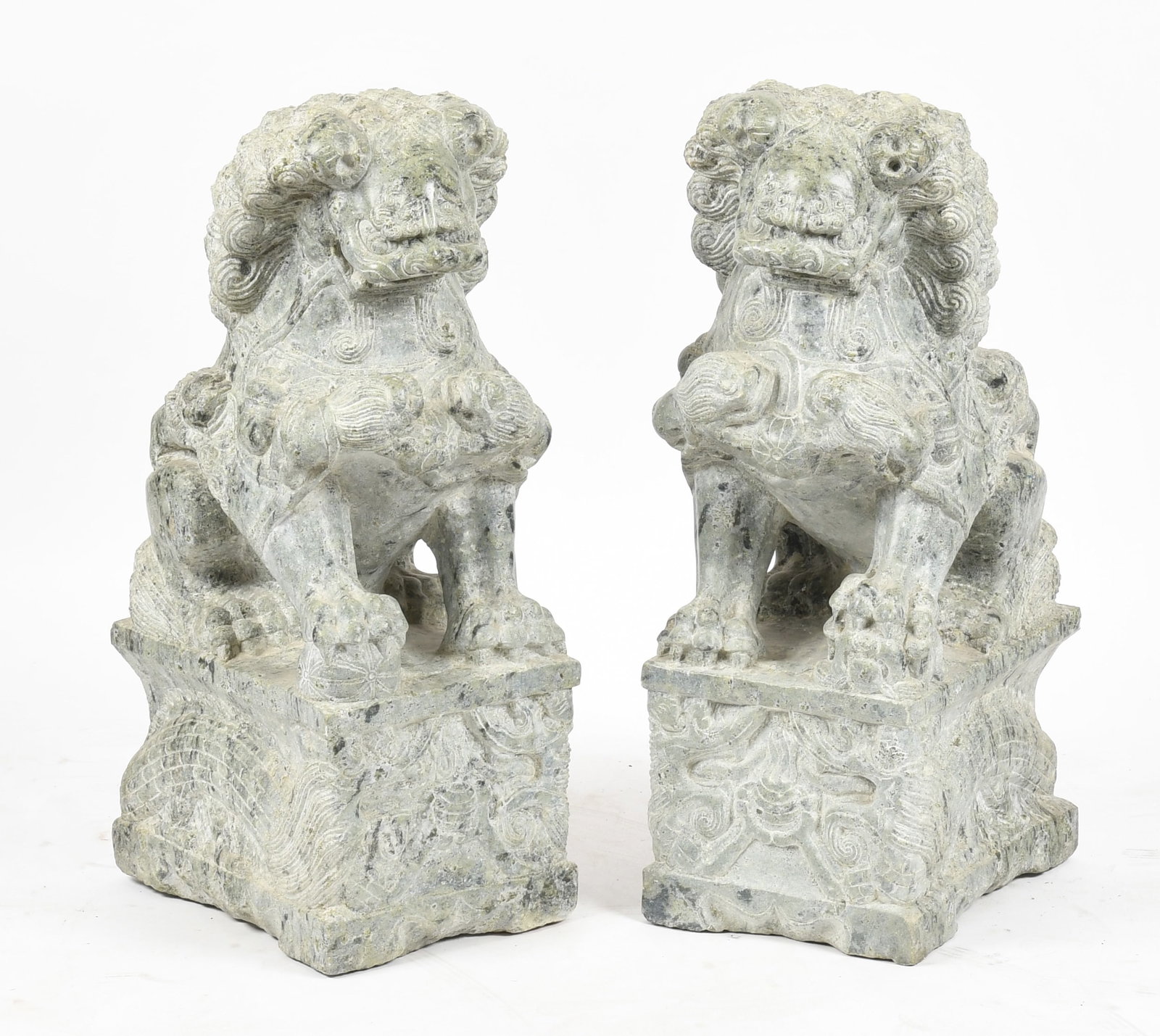 A Pair of Large Green Marble Carved Foo Dogs, 20th Century: A Pair of Large Green Marble Carved Foo Dogs, 20th Century Seated on dragon-decorated plinths. Dimensions: 15 1/2 in. x 12 in., 32 1/2 in. high. ***Heavy*** 