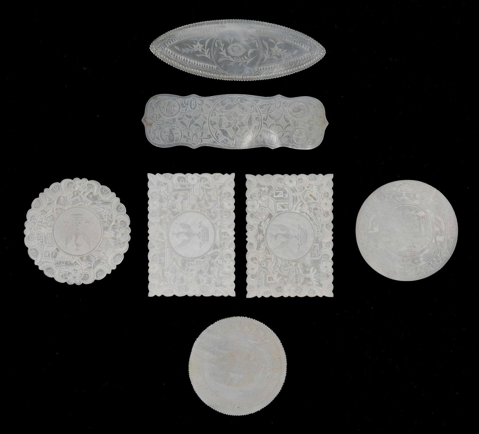 Chinese Export Mother-of-Pearl Game Pieces/Counters: Chinese Export Mother-of-Pearl Game Pieces/Counters Late 18th century, a variety of over fifty pieces of various sizes and shapes including fish, rectangles and circles with engraved deco