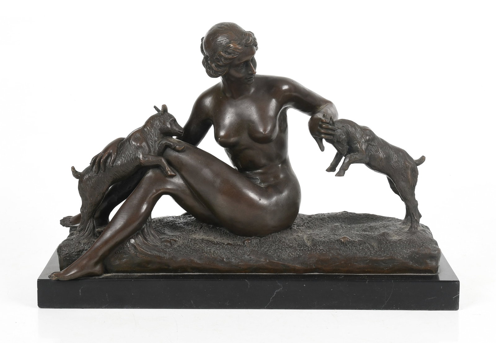 After Maurice Guiraud Riviere (French, 1881-1947), "Nymphe Aux Chevreaux" Bronze Sculpture: After Maurice Guiraud Riviere (French, 1881-1947), "Nymphe Aux Chevreaux" Bronze Sculpture Depicting a seated nude female playing with two goats, signed "M GUIRAUD RIVIERE" 
