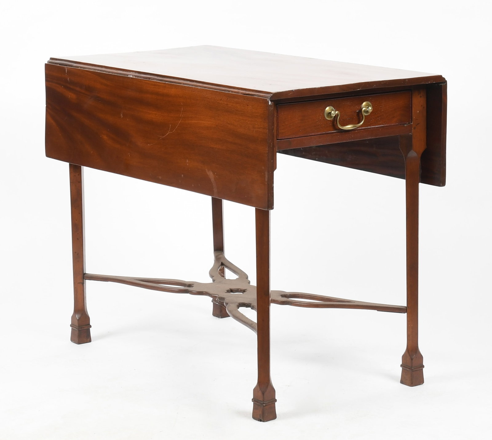 A George III Mahogany Pembroke Table, Late 18th Century: A George III Mahogany Pembroke Table, Late 18th Century With single drawer and canted legs joined by a flat pierced stretcher. Dimensions: 35 1/2 in. long, 19 1/4 in. wide