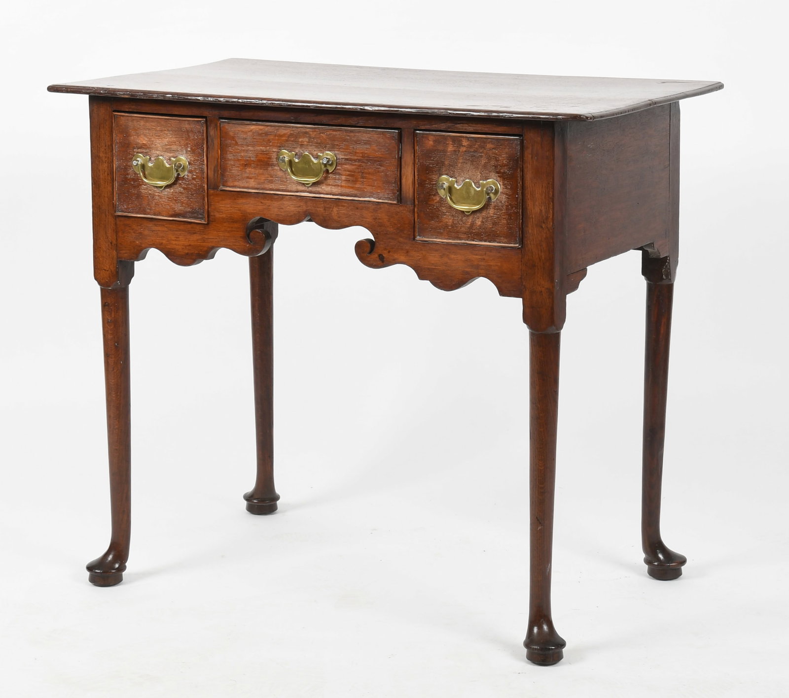 A Queen Anne Oak Dressing Table, Mid 18th Century: A Queen Anne Oak Dressing Table, Mid 18th Century Dimensions: 32 in. wide, 18 3/4 in. deep, 28 in. high Provenance: From a local collection.