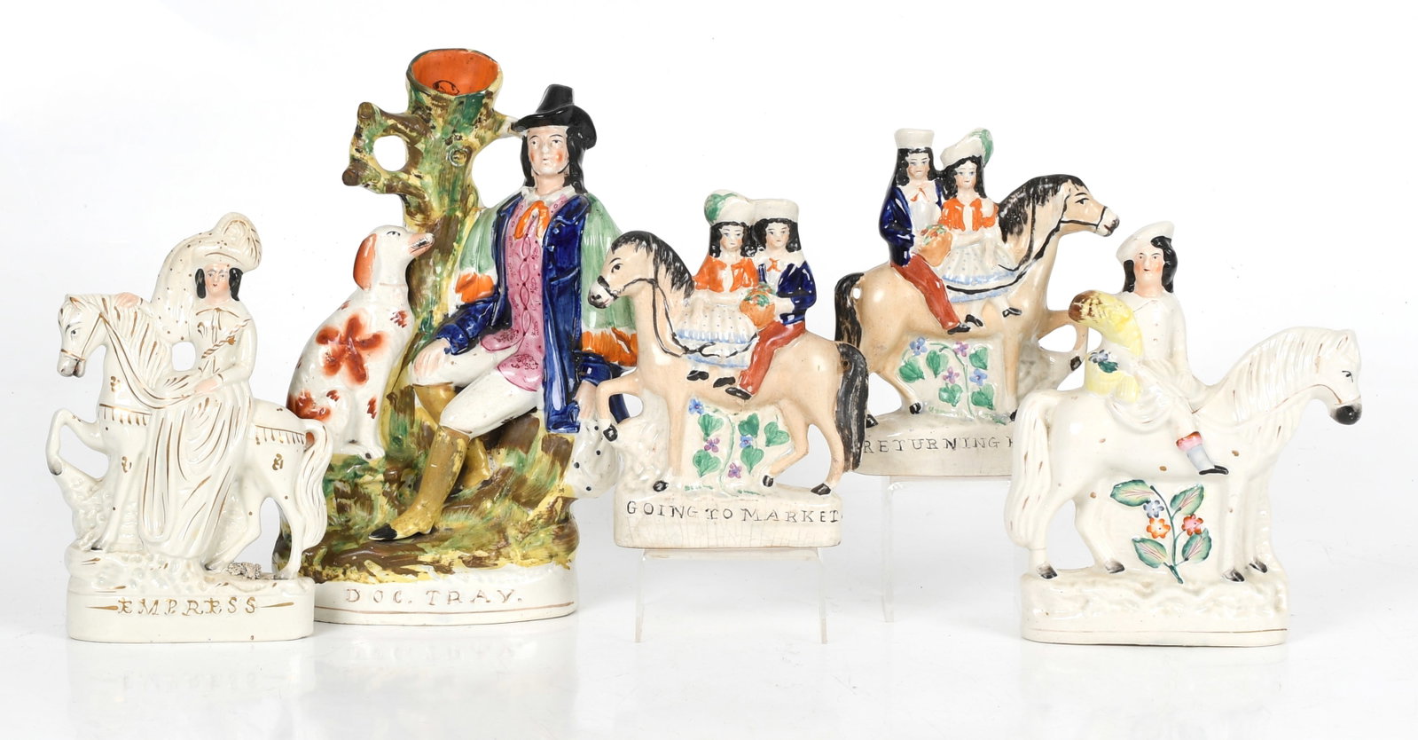 Five English Staffordshire Hand-Painted Ceramic Figural Groups, Mid 19th Century: Five English Staffordshire Hand-Painted Ceramic Figural Groups, Mid 19th Century Comprising: a "dog tray" spill vase with gentleman and spaniel; a pair of couples on horsebacks titled