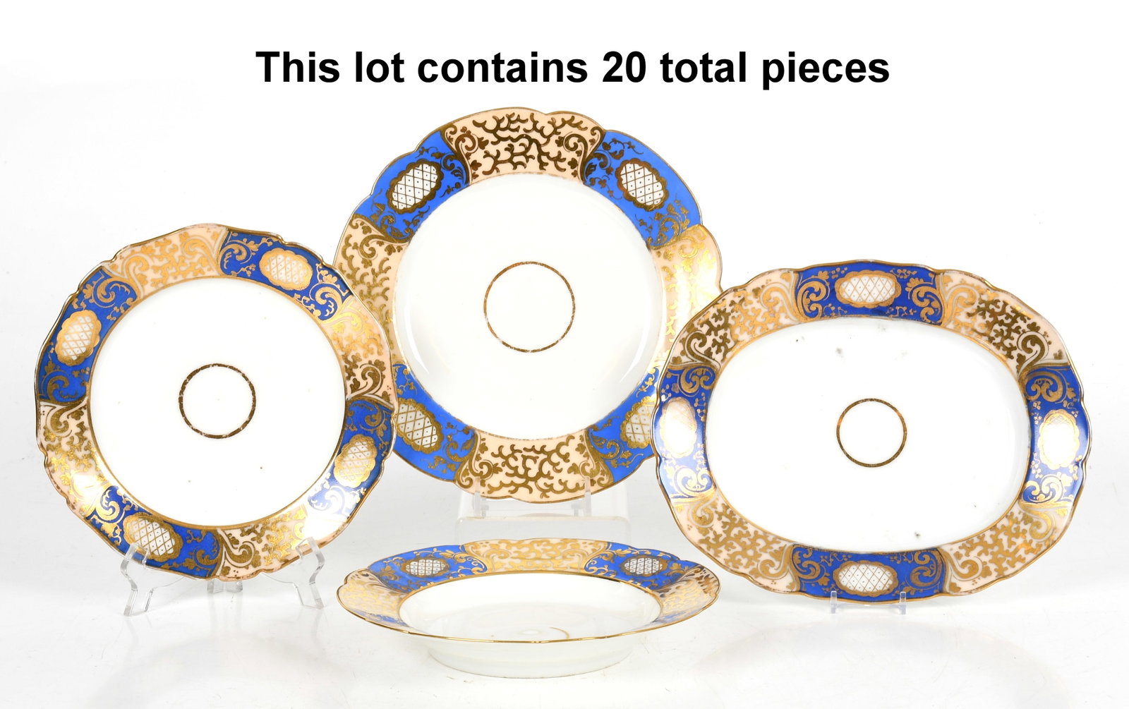 Twenty Pieces of Blue and Parcel-Gilt Porcelain Plates, 19th/ 20th Century: Twenty Pieces of Blue and Parcel-Gilt Porcelain Plates, 19th/ 20th Century Rococo style, comprising two oval platters (10 in. x 8 in.), twelve dinner plates (9 1/2 in. diameter), two salad plat