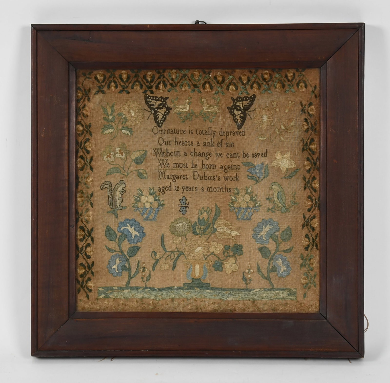 A Pennsylvania Silk on Linen Sampler, c. 1830-1840: A Pennsylvania Silk on Linen Sampler, c. 1830-1840 Wrought by Margaret Dubois, aged twelve years, with a verse within a flowering vine border and various naturalistic motifs, including butterfl