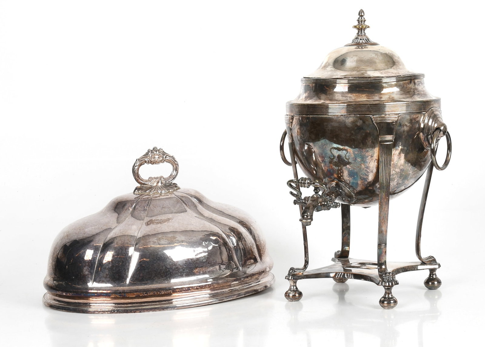 Two Pieces of English Silver Plate: Two Pieces of English Silver Plate 19th century, comprising: a hot water urn with bun feet, paw and column legs and reeded borders (no burner), and a large lobed tray cover with an