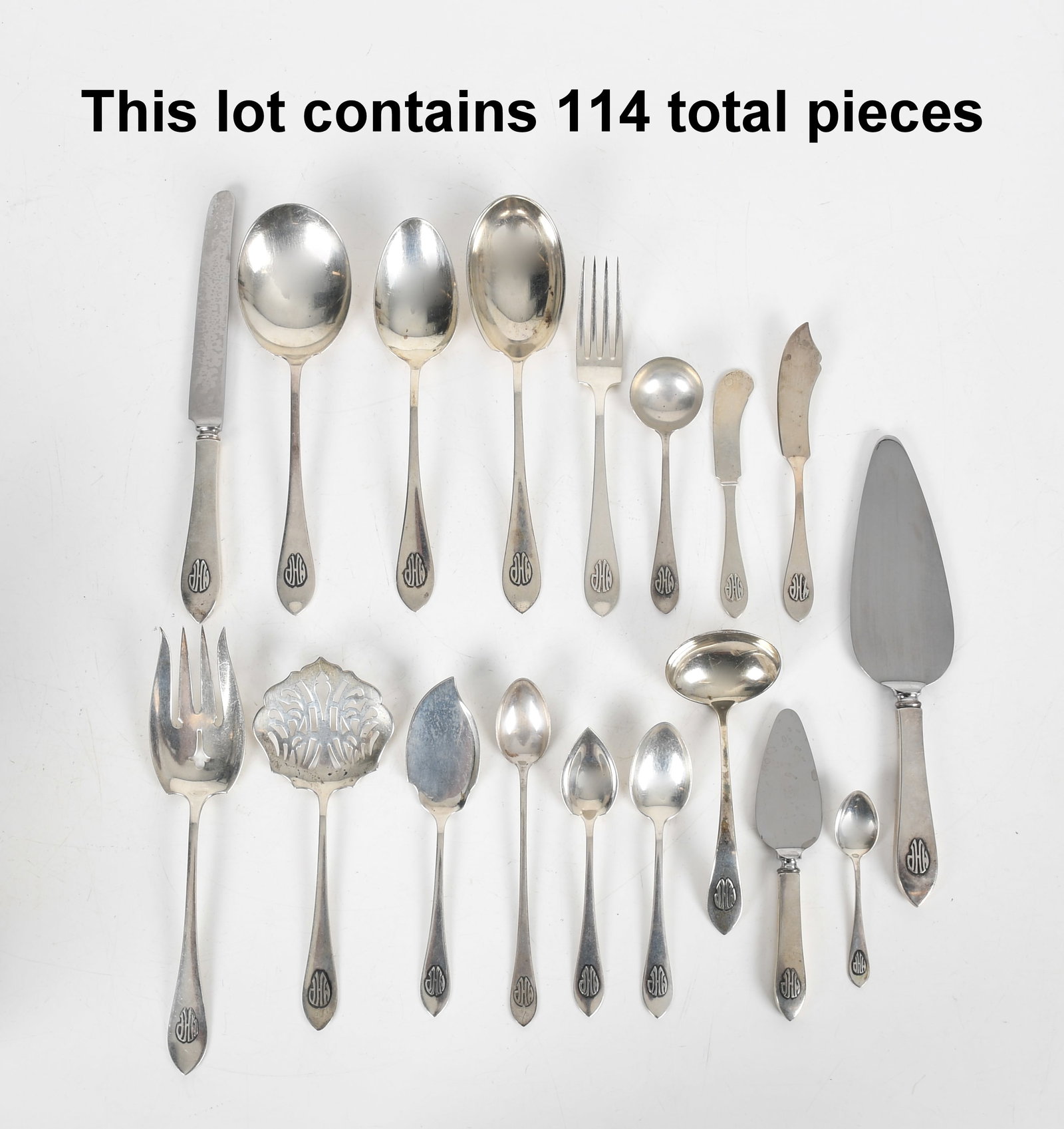 A Watson Co. Sterling Silver Flatware Service: A Watson Co. Sterling Silver Flatware Service 20th century, in the "Colonial Antique" pattern with applique "MHP" monogram, comprising: nine 8in forks, eleven 7