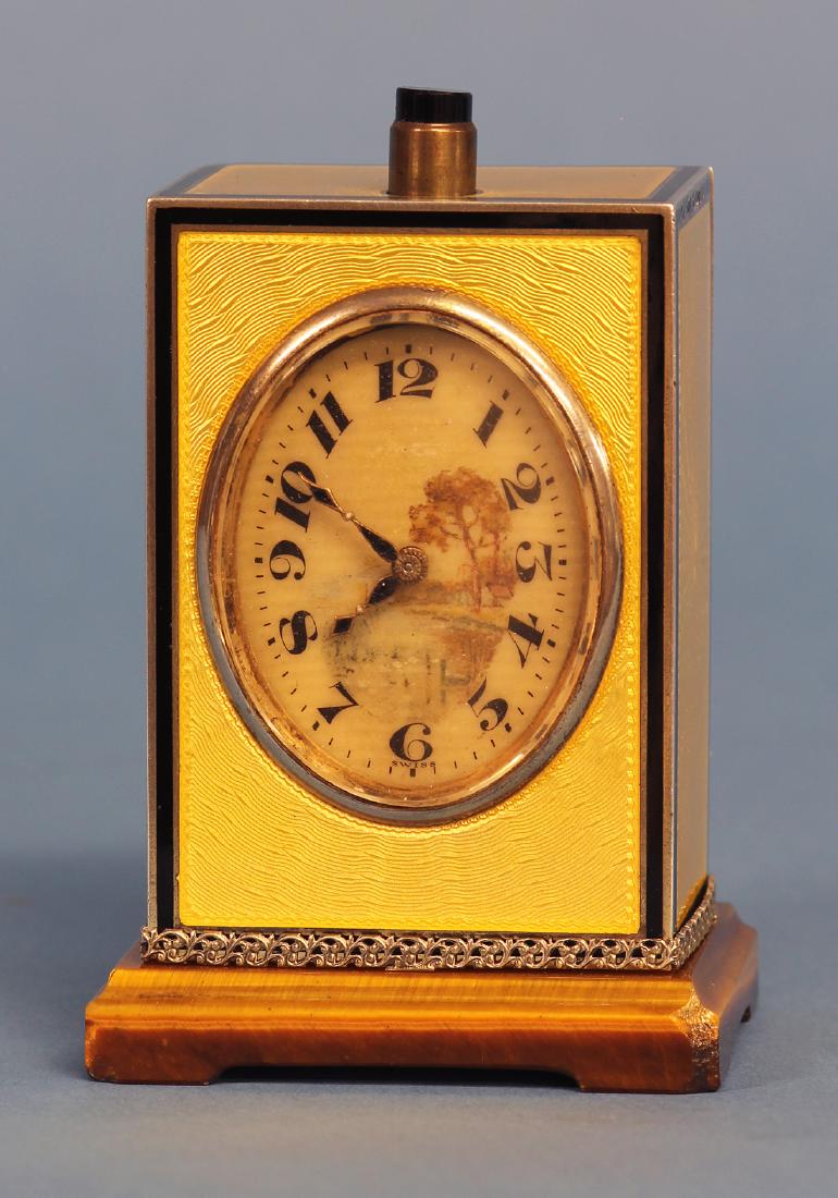 Small Silver Guilloche Quarter Repeat Desk Clock.: D Fresard, Lucerne. Silver rectangular case with yellow guilloche enameling, black opaque borders, a stone base and silver fretwork and bezel. Hinged back door with multiple stamps including 11698, St