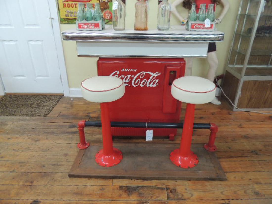 coca cola: Coca cola Cooler Bar with stools: cooler has been restored and is in excellent condition; very well done; stools are built on early Ford Truck axles; please contact auction house for shipping options