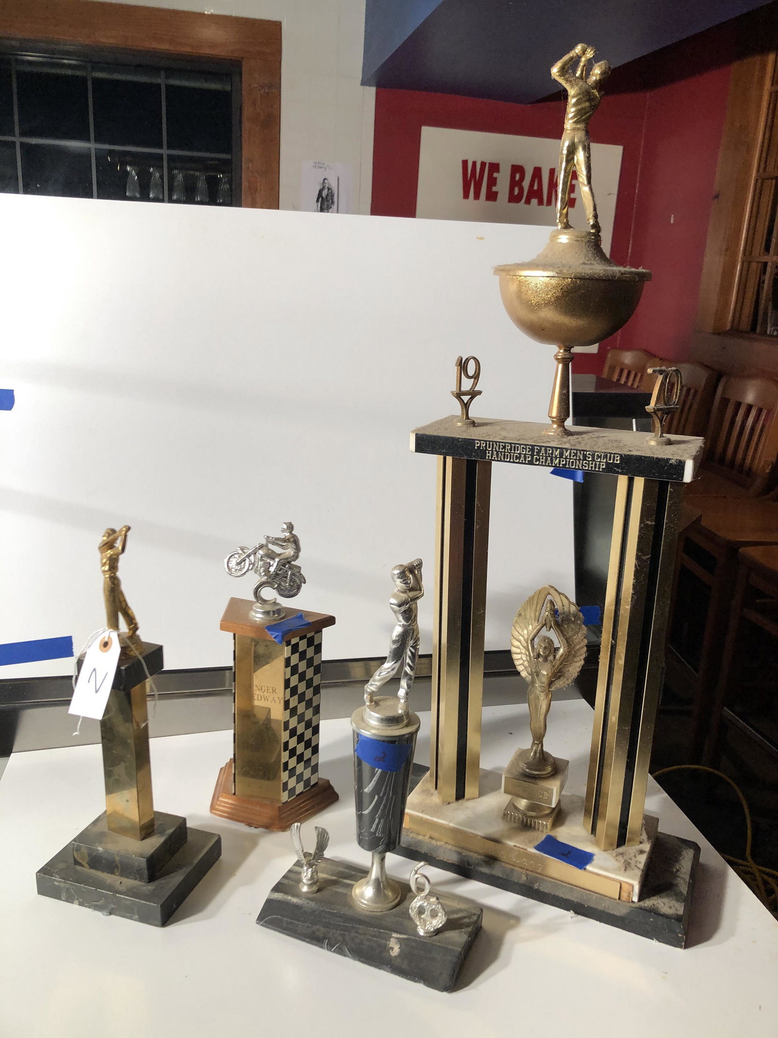 Trophies: 4 pieces sports trophies