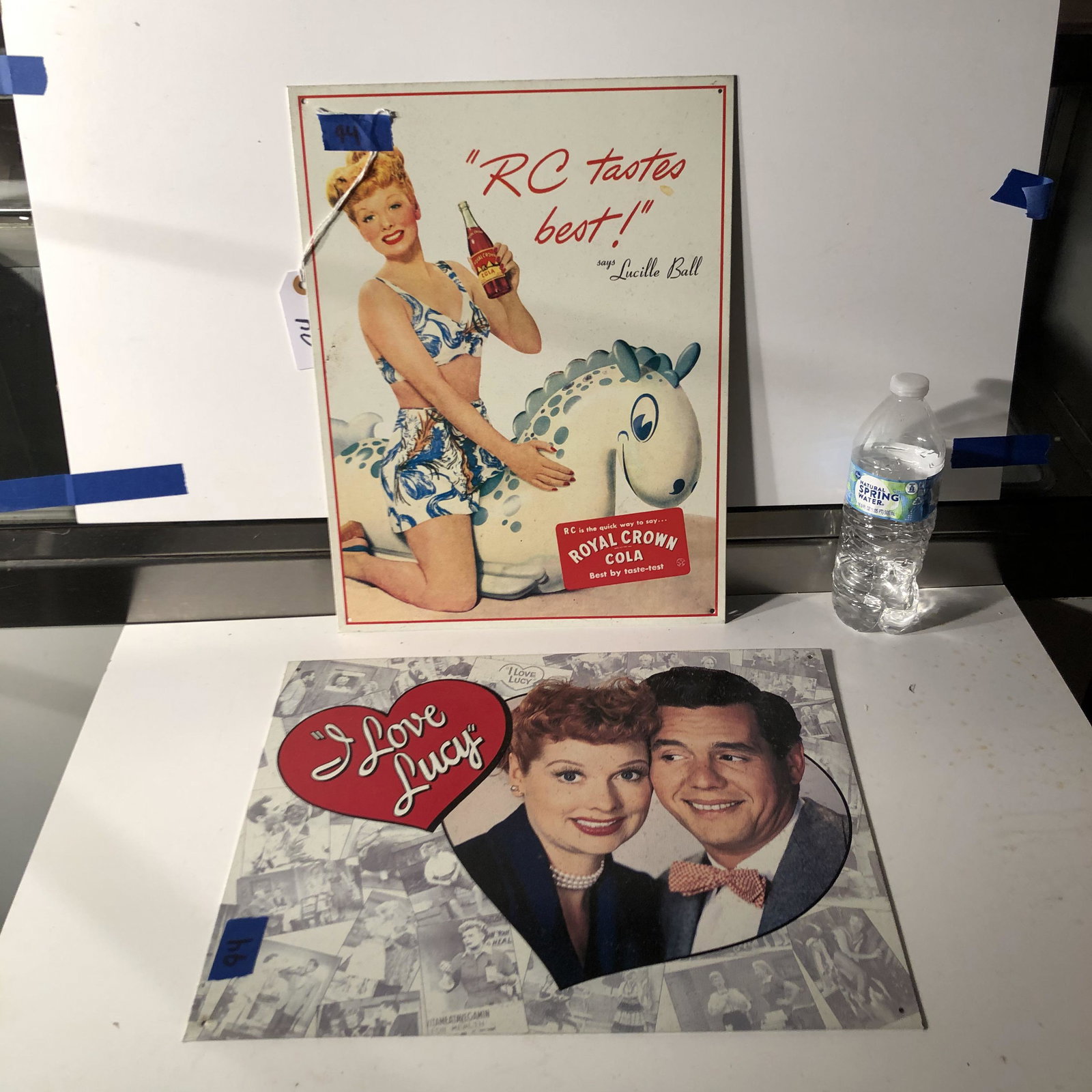 sign: lot of 2 signs metal lucy and rc