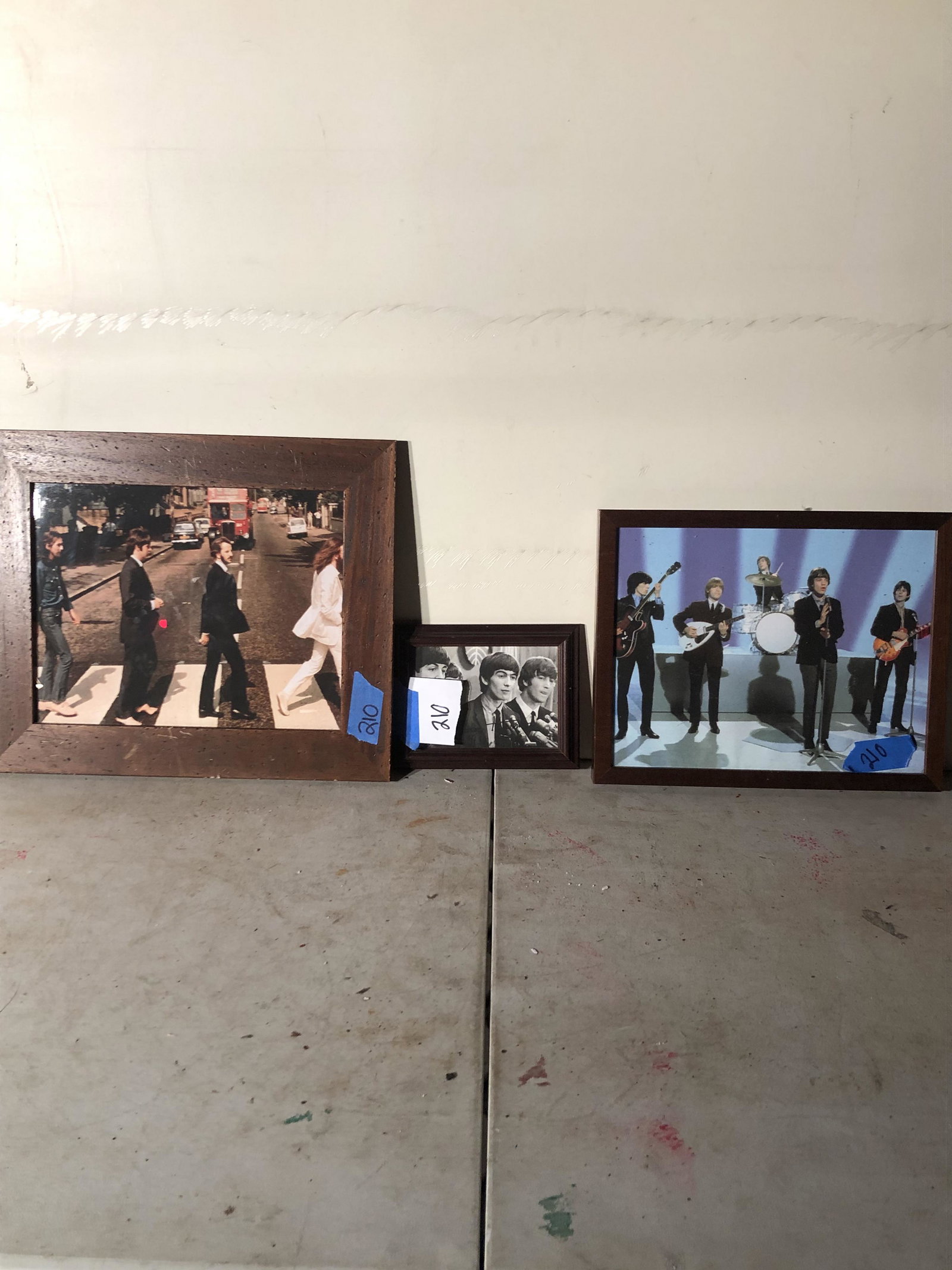 memorabilia: lot of 3 beatles pictures have been nailed to the wall