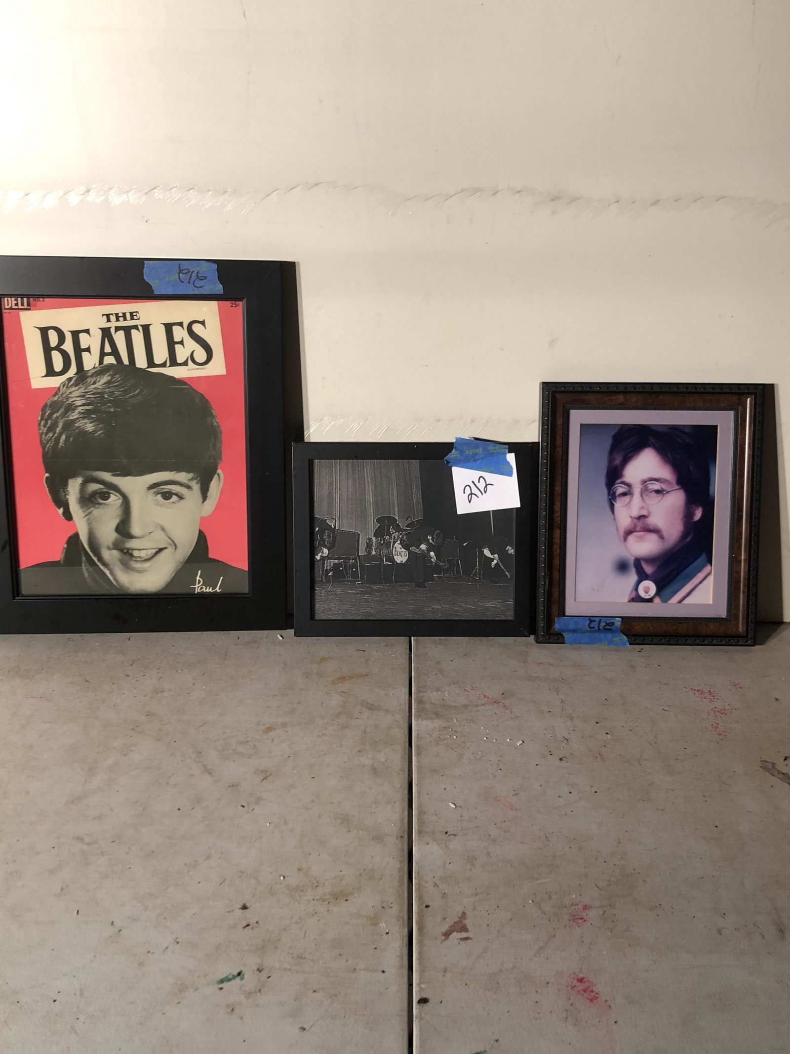 memorabilia: lot of 3 beatles pictures have been nailed to the wall