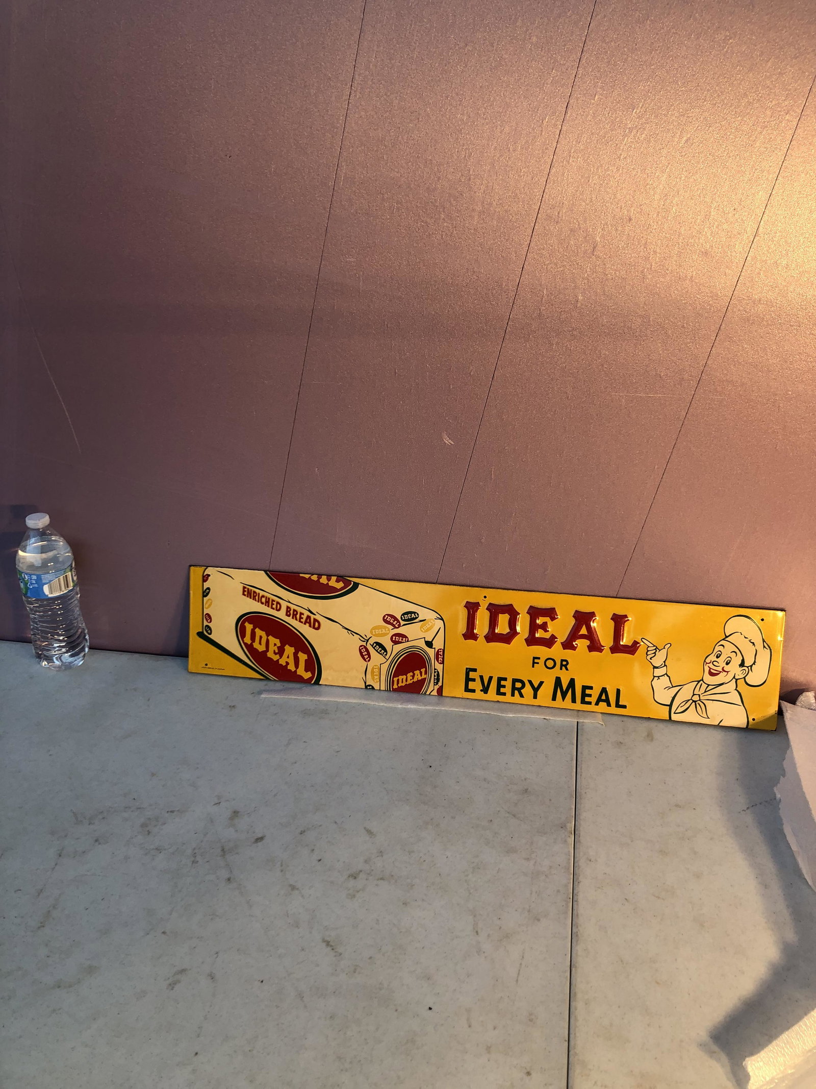 Ideal Bread: Ideal bread sign notice the baker man in the graphics colors are excellent this one would be hard to upgrade has green back 37.5x5.5 inches