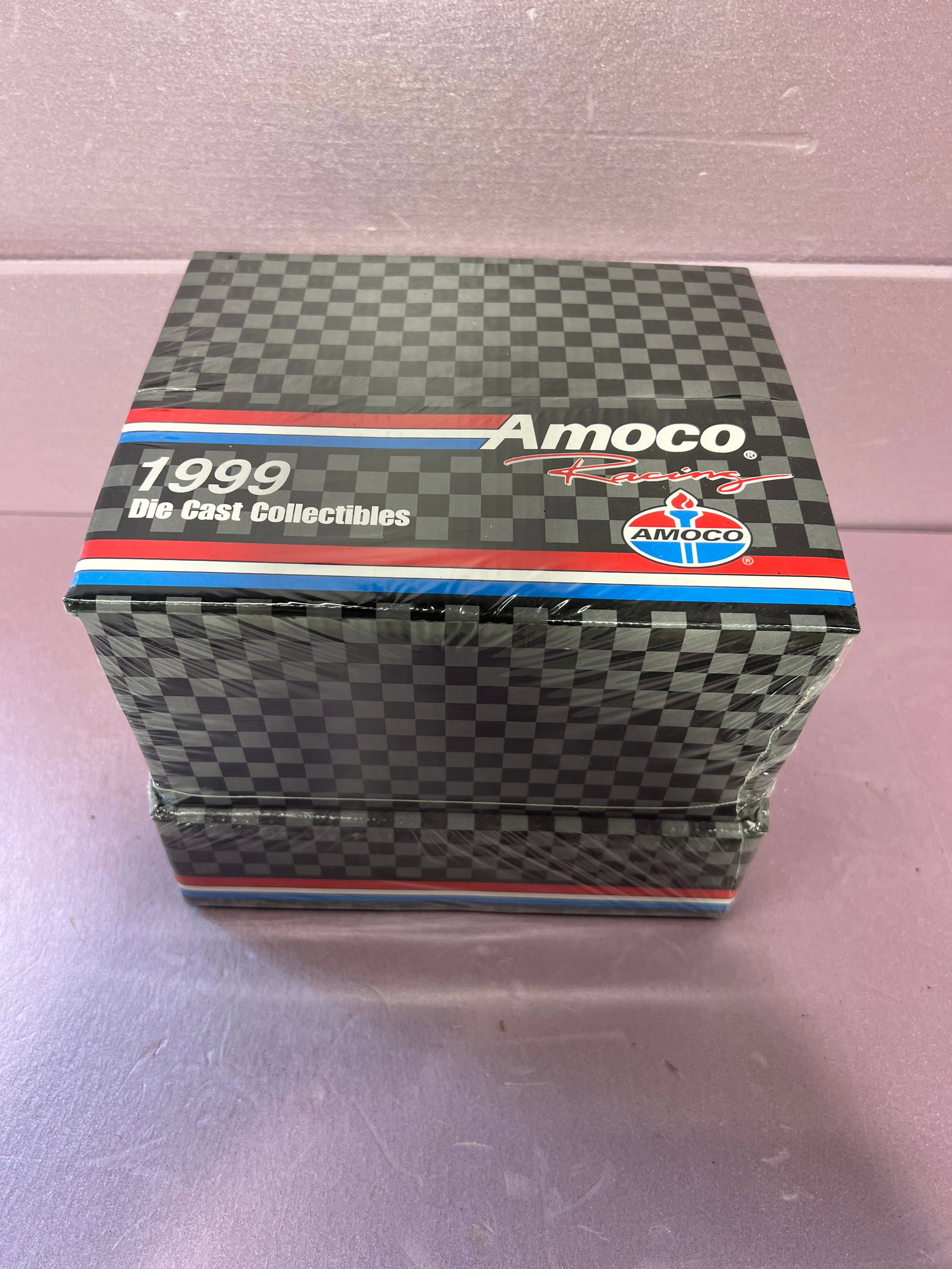 Amoco Die Cast Cars: this is an unopened box that contains 24 cars; 1:64 scale and in individual boxes. Amoco racing advertisment from 1999 in excellent condition see pics for description