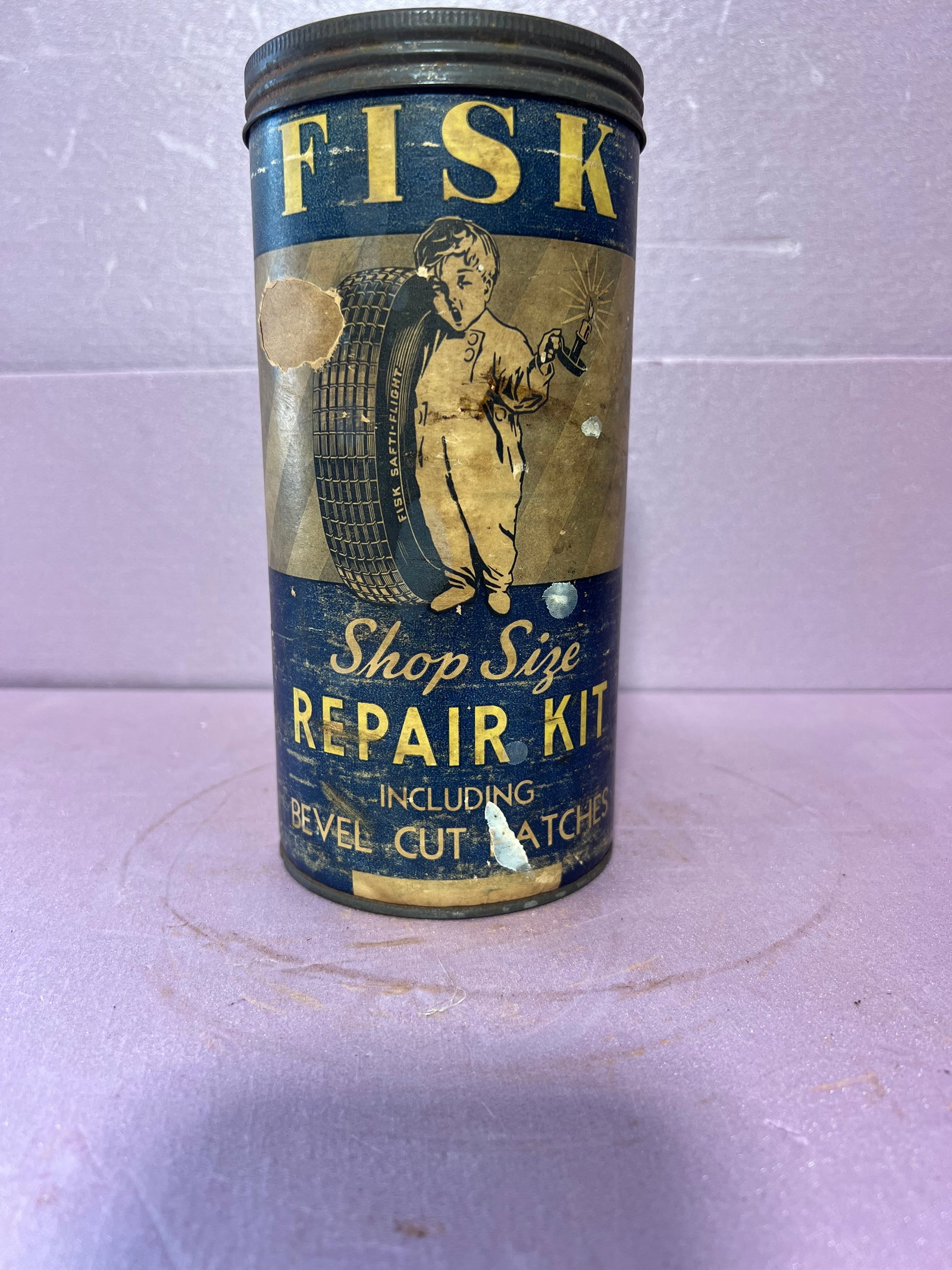 Fisk Tire Repair Kit: Shop Size FISK tire repair kit canister "EMPTY" has the screw on lid. Shows wear overall shows well for age. Has wear, see pics for description
