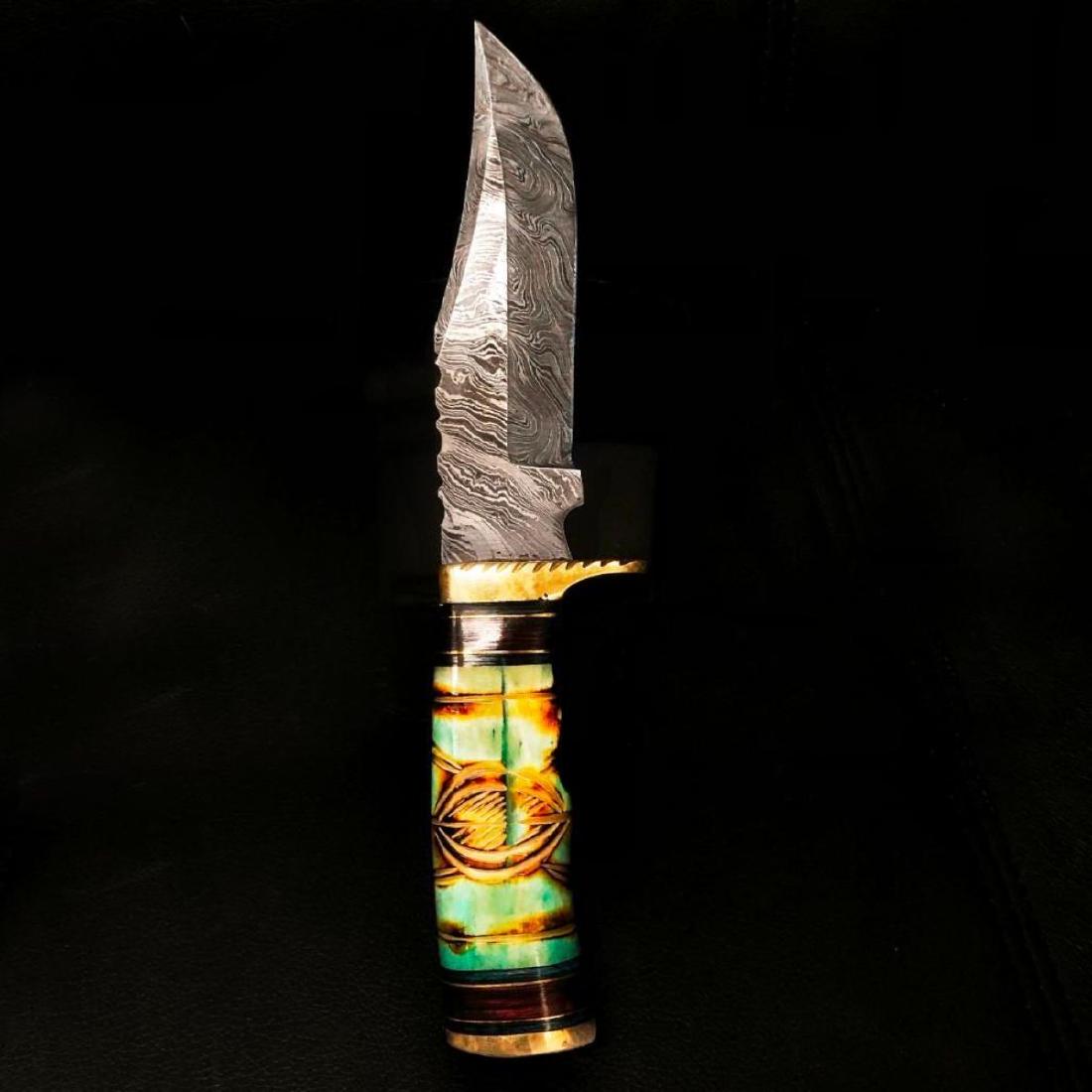 Damascus Knife: High Quality steel is utilized to forge the finest product in the world. Unique Custom Hand-Forged Damascus Steel Hunting Bowie Knife Handle Construction: Camel Bone, Colored Wood and Brass Spacers. B