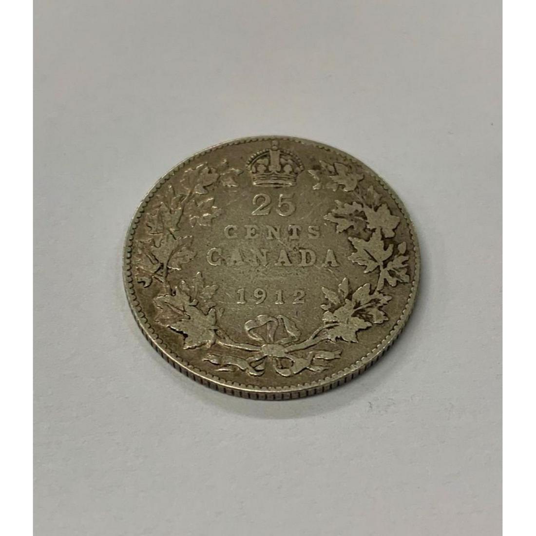 1912 Canadian 25 Cent Coin: Obverse The portrait in left profile of George V is surrounded with the inscription "GEORGIVS V DEI GRA: REX ET IND:IMP" (George V, King and Emperor of India by the grace of God) Lettering:Â GEORGIV