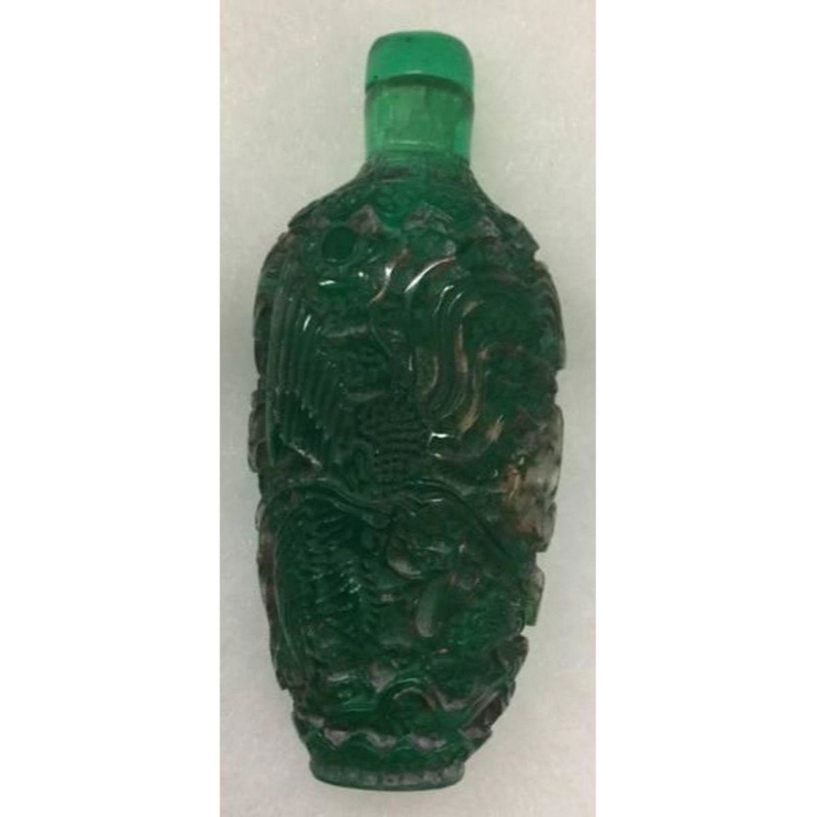 Asian Green Dragon Glass Snuff Bottle A green glass snuff bottle with dragon