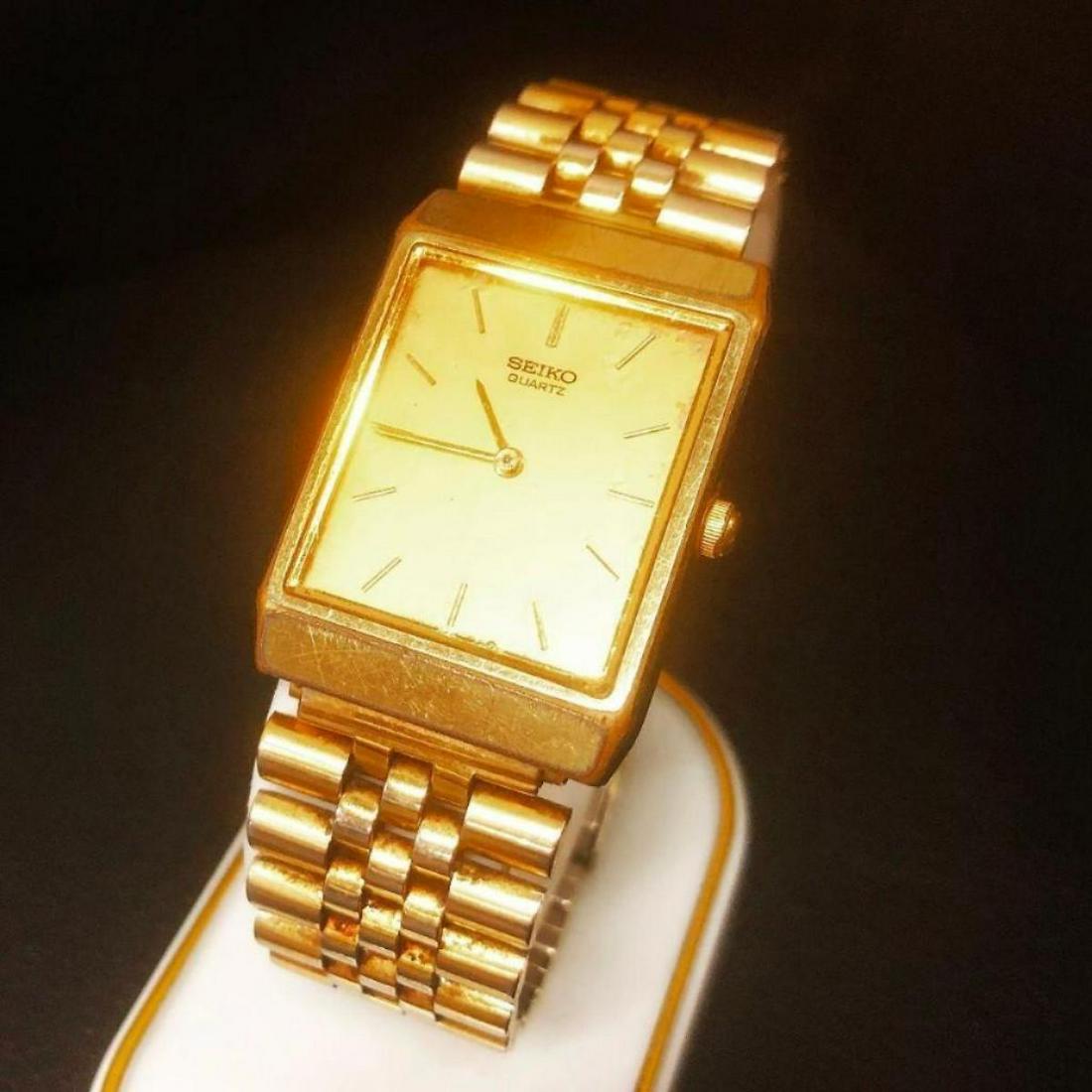 Mens Seiko Quartz Stainless Steel Gold Tone Watch: Mens Seiko Quartz Stainless Steel Gold Tone Watch. Linked Band Is Slightly Use and Worn. Watch is in working Order Used Condion. - All items may be shipped or picked up locally within one week of sale