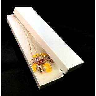 Contemporary rose gold chain necklace with flower: Contemporary rose gold chain necklace with flower motif.