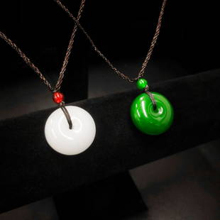 Pair Of Asian White & Green Jade Carved Pendants: One Green Jade Carved Pendant and A White Jade Carved Pendant. Lot Is For Both Asian Carved Pieces. View Photos For Further Details.