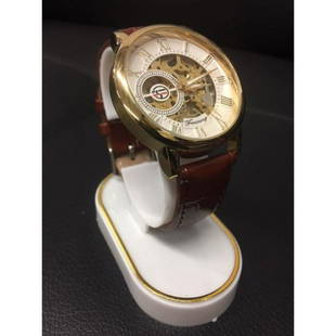 Forsining Wrist Watch Skeleton Dial with Mechanical: An Automatic Forsining Wrist Watch Skeleton Dial with Mechanical Movement. Has Stainless Steel Case and Luxury Band. View Photos For Further Details