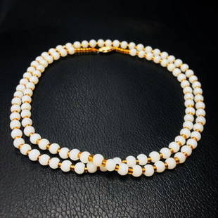 Asian White Jade Necklace 14k Gold Plated Clasp With: Asian White Jade Necklace With 14k Gold Plated Clasp which comes with a Chinese Window Shade Box. See photos for further details.