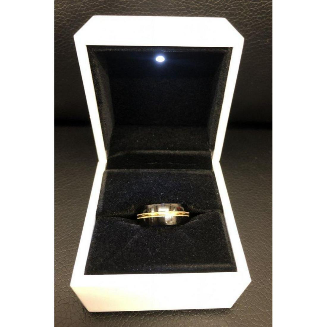 Ladies Titanium Black & Gold Engagement Ring, Brand: Ladies Titanium Black & Gold Engagement Ring, Brand New, Size 8. Comes In White Enameled LED Ring Box.