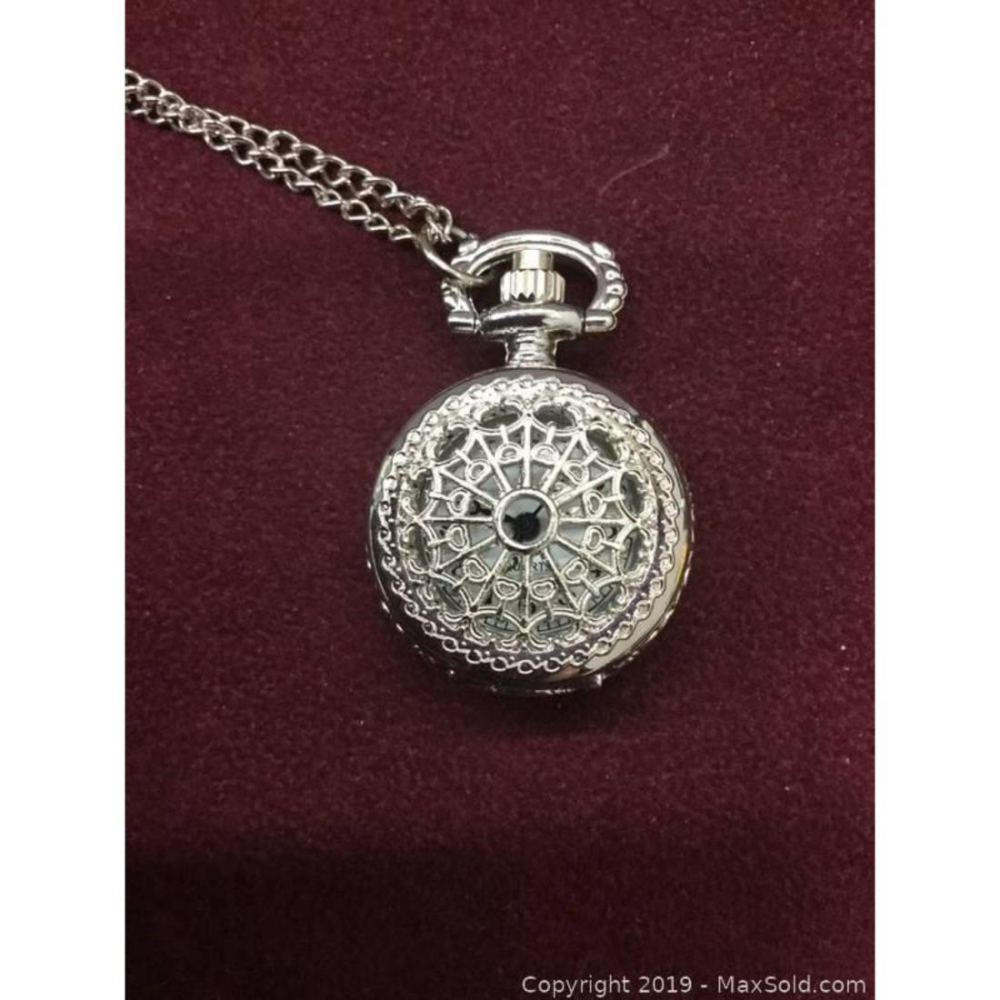 Elegant Silver Tone Watch Pendant Necklace: Elegant Silver Tone, Quartz Watch Pendant Necklace, New, Working Quartz Clock. View Photos For Further Details.