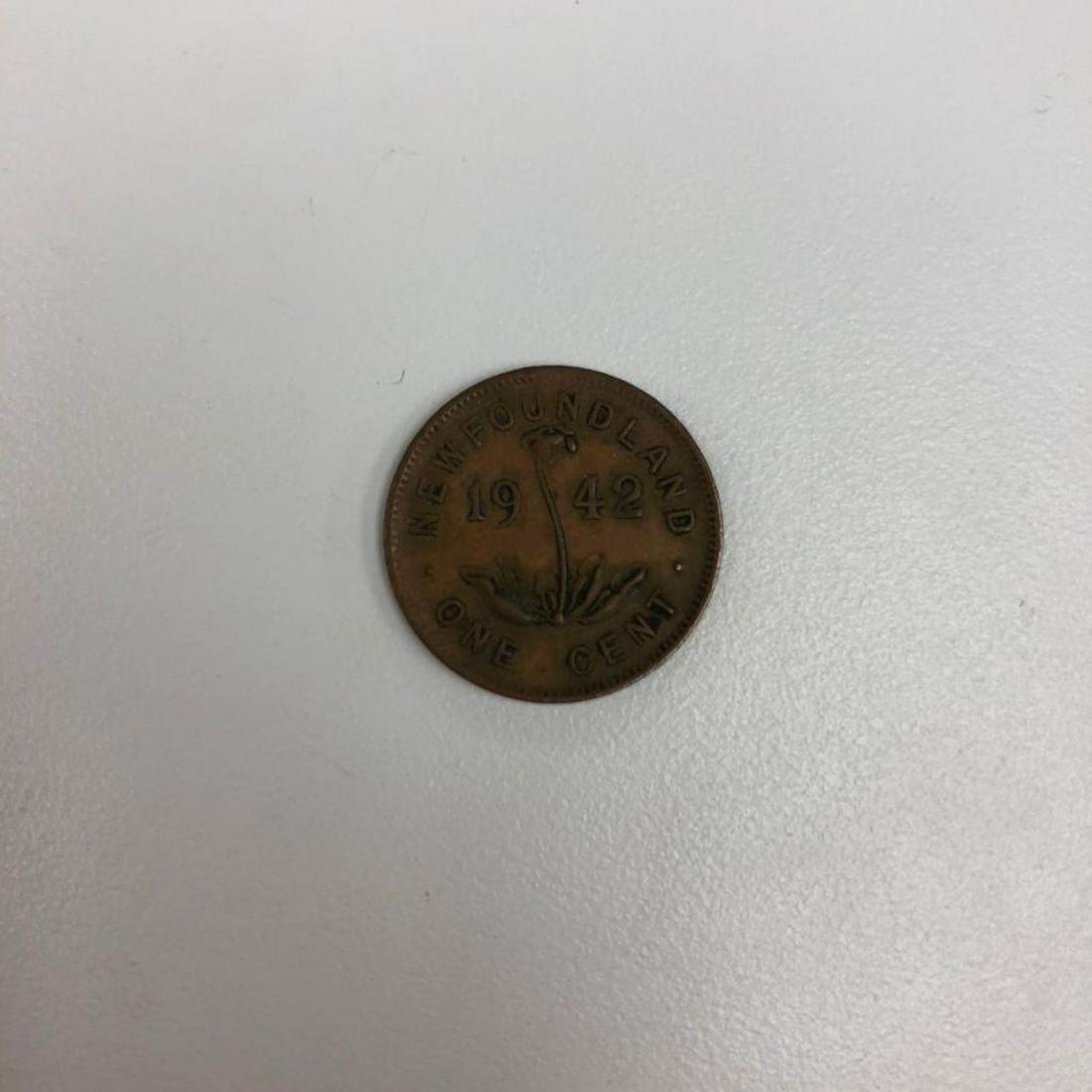 1942 George VI Newfoundland 1 Cent: Obverse The portrait of crowned King George VI, facing left. Lettering:Â GEORGIVS VI DEI GRA. REX ET IND. IMP. Translation: GEORGIVS VI DEI GRA. REX ET IND. IMP. â†’ "George VI, Dei Gratia Rex,