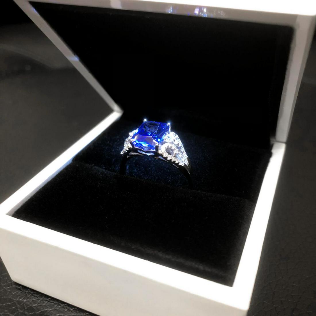 Exquisite Ladies Silver 925 Blue Tanzanite Ring With: Exquisite Ladies Silver Tone Blue Tanzanite Ring, Brand New, Size 8.Â See Photos For Further Inquiry. Â